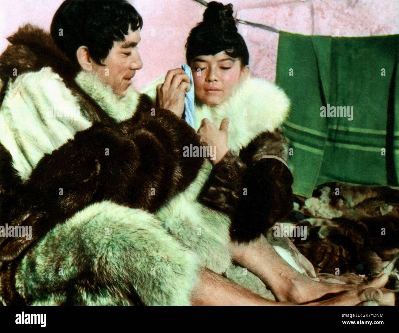 Anthony Quinn & Yoko Tani Film: The Savage Innocents (1968) Characters: Inuk & Asiak  Director: Nicholas Ray 01 March 1960   **WARNING** This Photograph is for editorial use only and is the copyright of PARAMOUNT and/or the Photographer assigned by the Film or Production Company and can only be reproduced by publications in conjunction with the promotion of the above Film. A Mandatory Credit To PARAMOUNT is required. The Photographer should also be credited when known. No commercial use can be granted without written authority from the Film Company. Stock Photo
