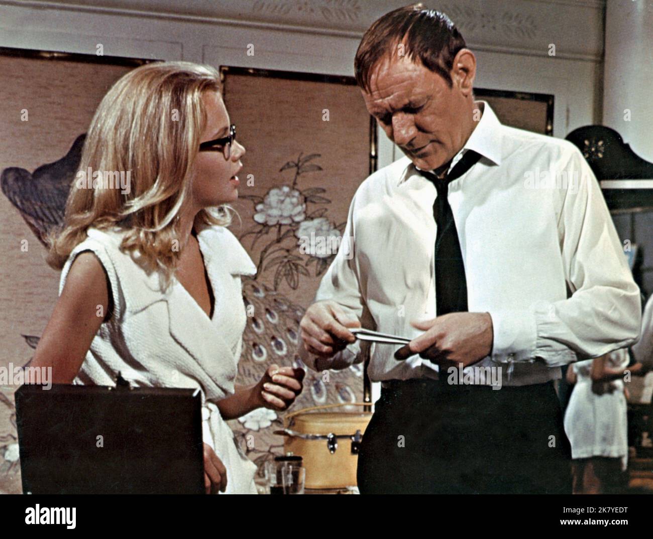 Trevor Howard & Hayley Mills Film: Pretty Polly (1964) Characters: Robert Hook & Polly Barlow  Director: Guy Green 19 October 1967   **WARNING** This Photograph is for editorial use only and is the copyright of UNIVERSAL and/or the Photographer assigned by the Film or Production Company and can only be reproduced by publications in conjunction with the promotion of the above Film. A Mandatory Credit To UNIVERSAL is required. The Photographer should also be credited when known. No commercial use can be granted without written authority from the Film Company. Stock Photo