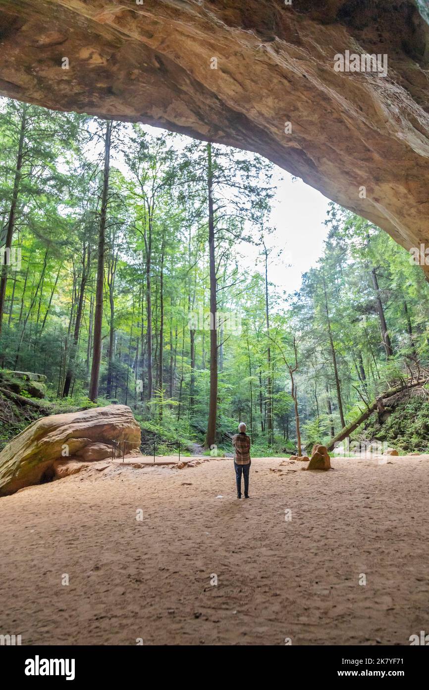 Logan, Ohio - Ash Cave at Hocking Hills State Park. The huge overhang is 700 feet long, 100 feet deep, and 90 feet high. It was used as shelter by Nat Stock Photo