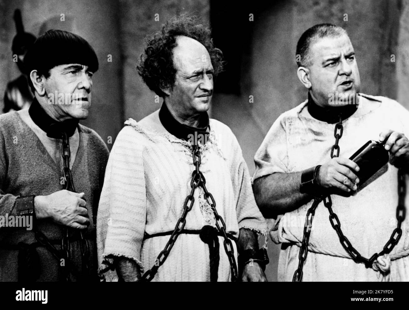 Moe Howard, Larry Fine & Joe Derita Film: The Three Stooges Meet Hercules (USA 1962) Characters: Moe,Larry & Curly Joe  Director: Edward Bernds 26 January 1962   **WARNING** This Photograph is for editorial use only and is the copyright of COLUMBIA PICTURES and/or the Photographer assigned by the Film or Production Company and can only be reproduced by publications in conjunction with the promotion of the above Film. A Mandatory Credit To COLUMBIA PICTURES is required. The Photographer should also be credited when known. No commercial use can be granted without written authority from the Film Stock Photo