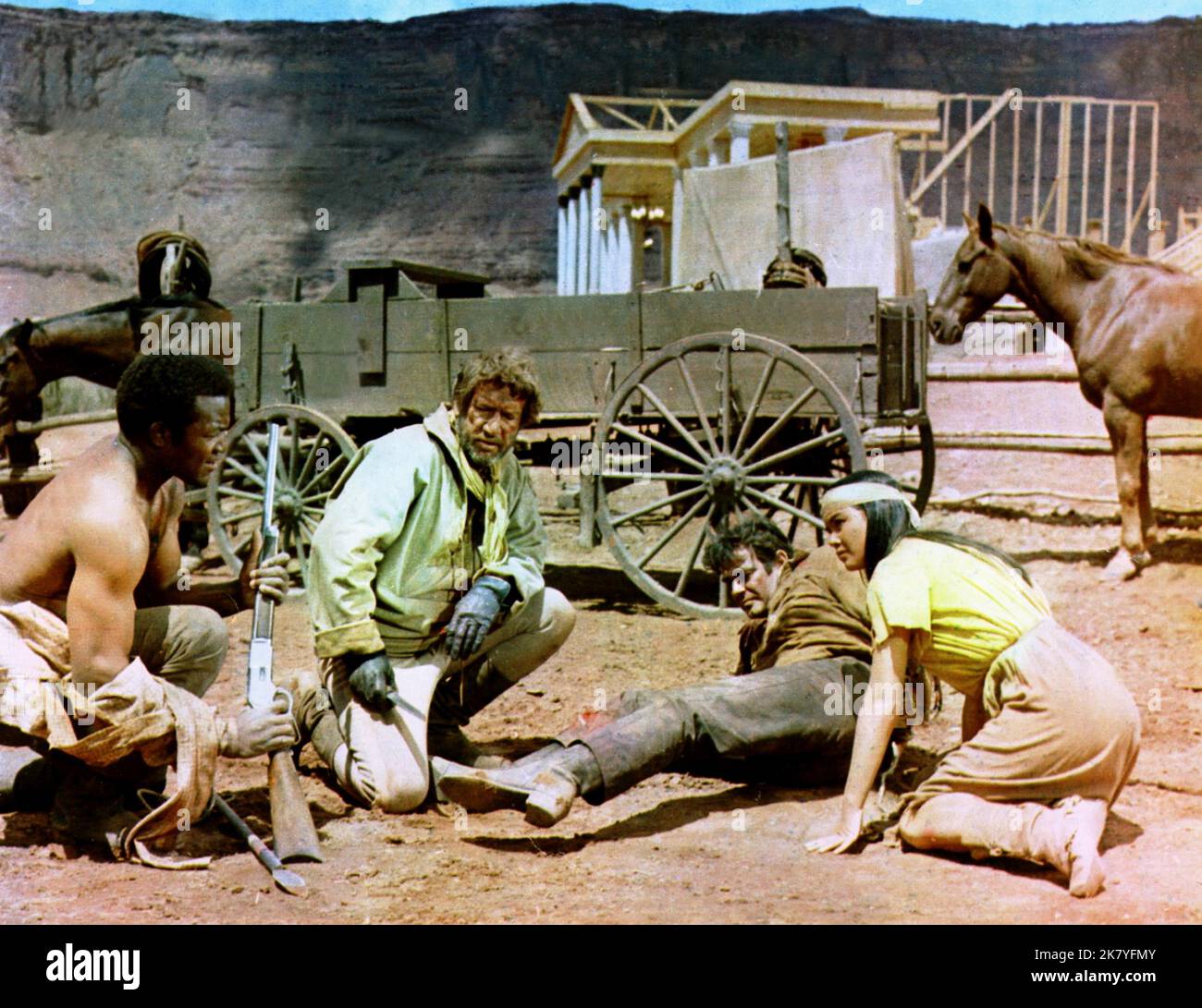 Jim Brown, Richard Boone, Stuart Whitman & Wende Wagner Film: Rio Conchos (1963) Characters: Sgt. Franklyn,Maj. James 'Jim' Lassiter,Capt. Haven & Sally (Apache girl)  Director: Gordon Douglas 28 October 1964   **WARNING** This Photograph is for editorial use only and is the copyright of 20 CENTURY FOX and/or the Photographer assigned by the Film or Production Company and can only be reproduced by publications in conjunction with the promotion of the above Film. A Mandatory Credit To 20 CENTURY FOX is required. The Photographer should also be credited when known. No commercial use can be grant Stock Photo