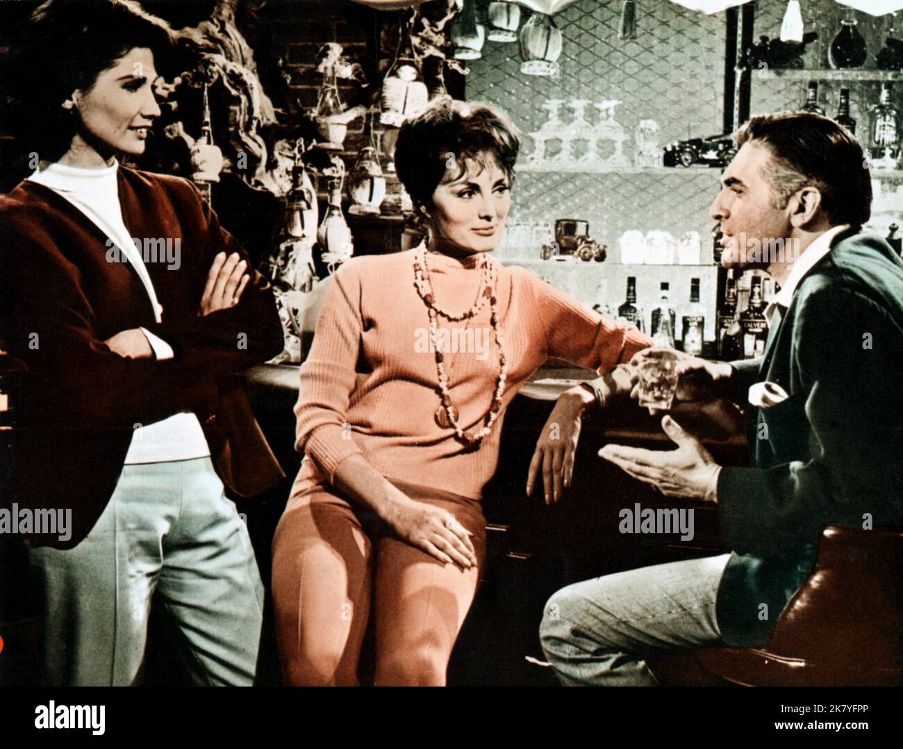 Marianna Hill, Charlene Holt & Anthony Rogers Film: Red Line 7000 (1963) Characters: Gabrielle,Lindy & Jim Loomis  Director: Howard Hawks 09 November 1965   **WARNING** This Photograph is for editorial use only and is the copyright of PARAMOUNT and/or the Photographer assigned by the Film or Production Company and can only be reproduced by publications in conjunction with the promotion of the above Film. A Mandatory Credit To PARAMOUNT is required. The Photographer should also be credited when known. No commercial use can be granted without written authority from the Film Company. Stock Photo