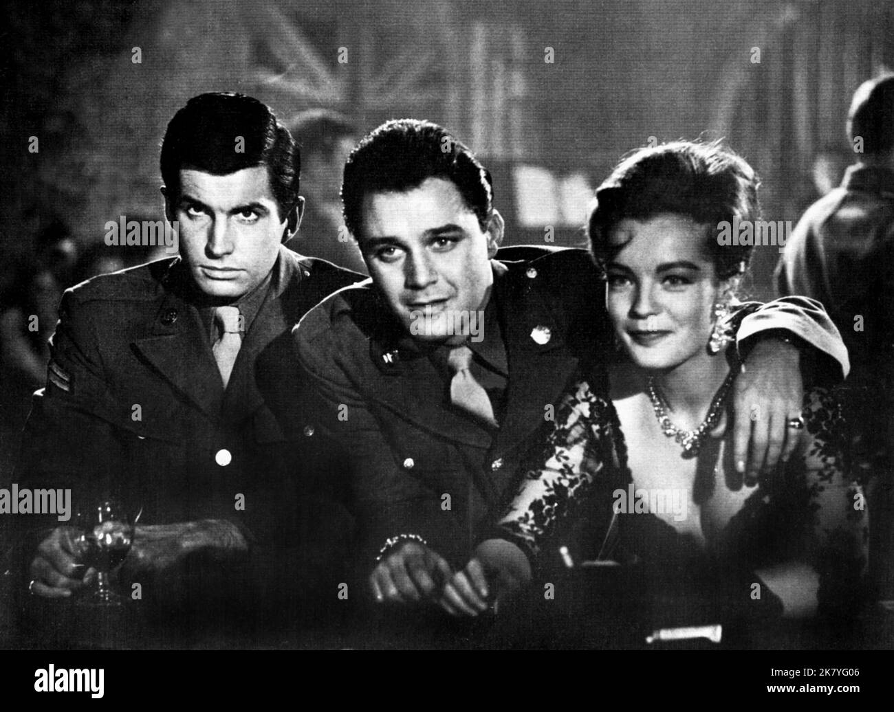 George Hamilton, Michael Callan & Romy Schneider Film: The Victors (USA/UK 1963) Characters: Trower,Eldridge & Regine  / Literaturverfilmung (Based On The Book By Alexander Baron) Director: Carl Foreman 18 November 1963   **WARNING** This Photograph is for editorial use only and is the copyright of COLUMBIA PICTURES and/or the Photographer assigned by the Film or Production Company and can only be reproduced by publications in conjunction with the promotion of the above Film. A Mandatory Credit To COLUMBIA PICTURES is required. The Photographer should also be credited when known. No commercial Stock Photo