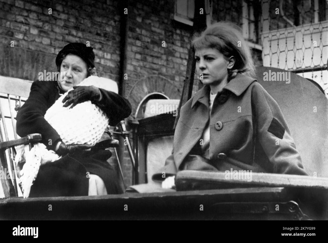 Doris Hare & Barbara Ferris Film: A Place To Go (1965) Characters: Lil Flint & Betsy  Director: Basil Dearden 01 July 1963   **WARNING** This Photograph is for editorial use only and is the copyright of 20TH CENTURY FOX and/or the Photographer assigned by the Film or Production Company and can only be reproduced by publications in conjunction with the promotion of the above Film. A Mandatory Credit To 20TH CENTURY FOX is required. The Photographer should also be credited when known. No commercial use can be granted without written authority from the Film Company. Stock Photo