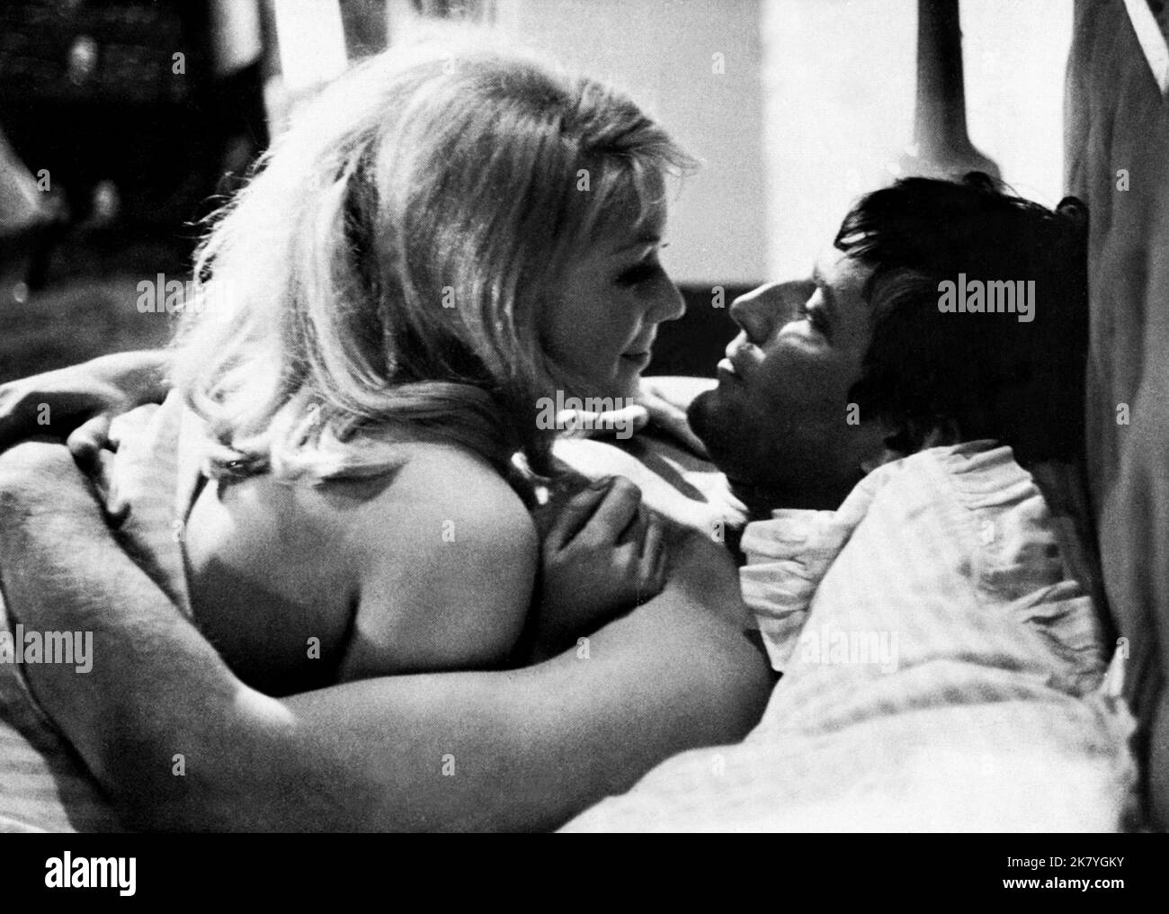 Annette Andre & Tom Bell Film: He Who Rides A Tiger (1965) Characters: Julie & Peter Rayston  Director: Charles Crichton 01 October 1965   **WARNING** This Photograph is for editorial use only and is the copyright of BRITISH LION and/or the Photographer assigned by the Film or Production Company and can only be reproduced by publications in conjunction with the promotion of the above Film. A Mandatory Credit To BRITISH LION is required. The Photographer should also be credited when known. No commercial use can be granted without written authority from the Film Company. Stock Photo