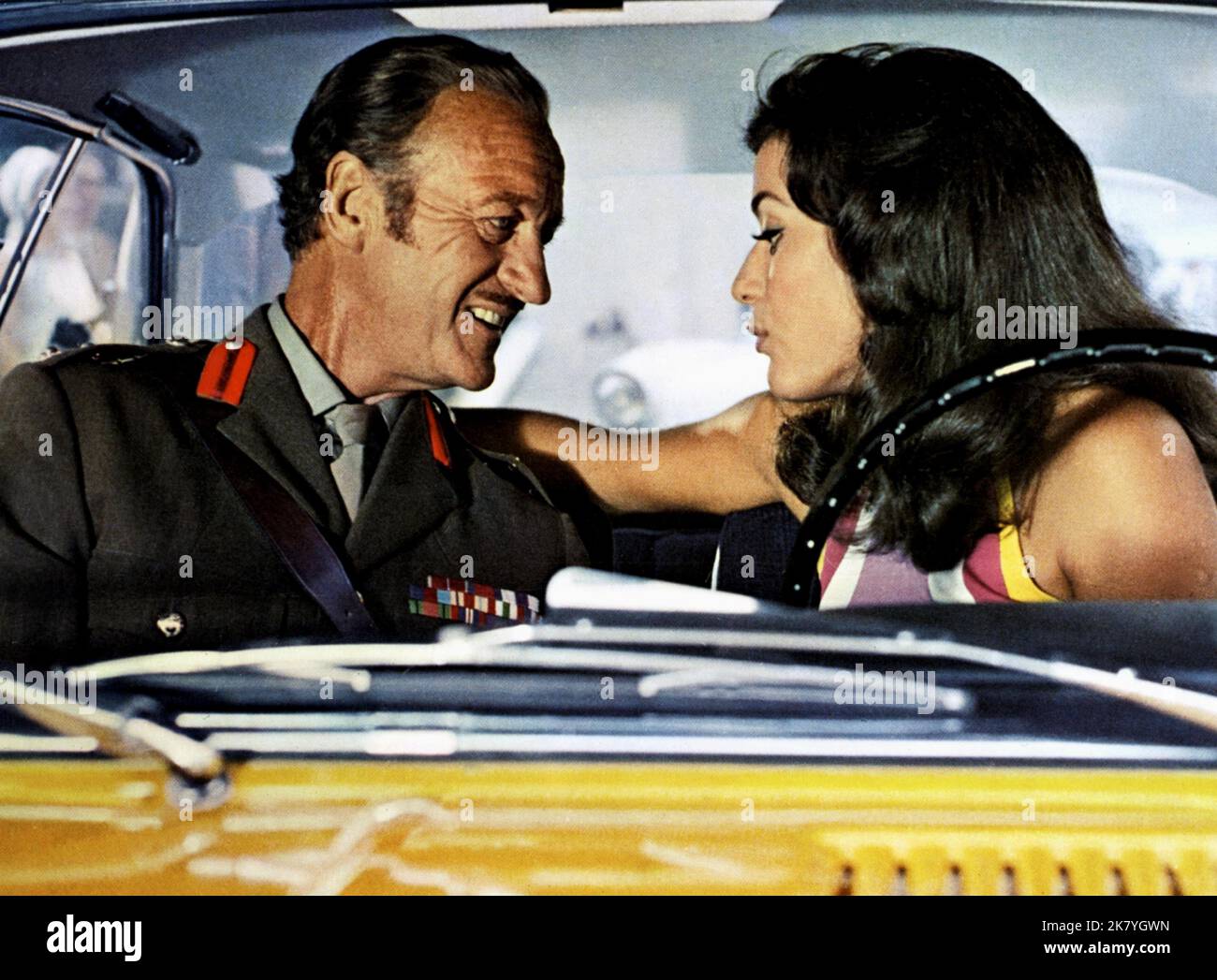 https://c8.alamy.com/comp/2K7YGWN/david-niven-silvia-monti-film-the-brain-le-cerveau-le-cerveau-characters-col-carol-matthews-sofia-frit-1969-director-gerard-oury-07-march-1969-warning-this-photograph-is-for-editorial-use-only-and-is-the-copyright-of-gaumont-international-andor-the-photographer-assigned-by-the-film-or-production-company-and-can-only-be-reproduced-by-publications-in-conjunction-with-the-promotion-of-the-above-film-a-mandatory-credit-to-gaumont-international-is-required-the-photographer-should-also-be-credited-when-known-no-commercial-use-can-be-granted-without-written-authority-from-the-2K7YGWN.jpg