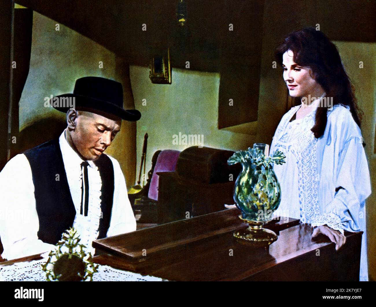 Yul Brynner & Janice Rule Film: Invitation To A Gunfighter (1966) Characters: Jules Gaspard d'Estaing & Ruth Adams  Director: Richard Wilson 14 October 1964   **WARNING** This Photograph is for editorial use only and is the copyright of UNITED ARTISTS and/or the Photographer assigned by the Film or Production Company and can only be reproduced by publications in conjunction with the promotion of the above Film. A Mandatory Credit To UNITED ARTISTS is required. The Photographer should also be credited when known. No commercial use can be granted without written authority from the Film Company. Stock Photo