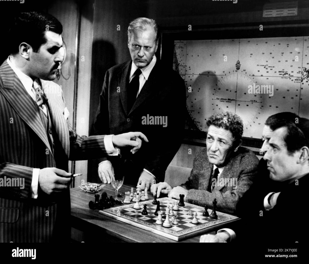 Mario Adorf, Curd Jürgens & Alan Gifford Film: Three Moves To Freedom; Brainwashed (DE 1960) Characters: Mirko Centowic, Werner von Basil  & Mac Iver  / Literaturverfilmung (Based On The Novella By Stefan Zweig) Director: Gerd Oswald 02 September 1960   **WARNING** This Photograph is for editorial use only and is the copyright of ROXY FILM and/or the Photographer assigned by the Film or Production Company and can only be reproduced by publications in conjunction with the promotion of the above Film. A Mandatory Credit To ROXY FILM is required. The Photographer should also be credited when know Stock Photo