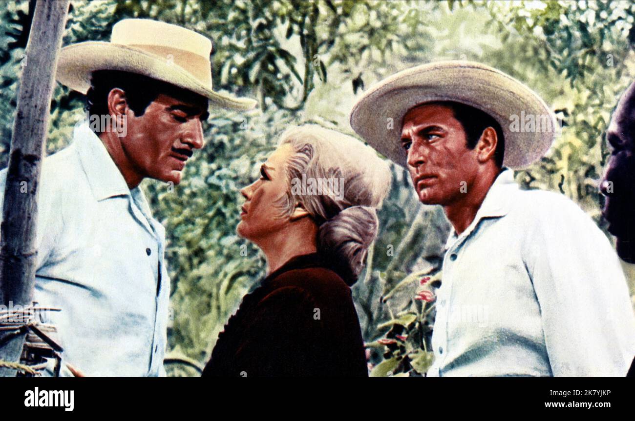 Gilbert Roland, Joan O'Brien & George Montgomery Film: Samar (1966) Characters: Col. Juan Sebastian Salazar, & Dr. John David Saunders  Director: George Montgomery 11 April 1962   **WARNING** This Photograph is for editorial use only and is the copyright of The Film Company and/or the Photographer assigned by the Film or Production Company and can only be reproduced by publications in conjunction with the promotion of the above Film. A Mandatory Credit To The Film Company is required. The Photographer should also be credited when known. No commercial use can be granted without written authorit Stock Photo