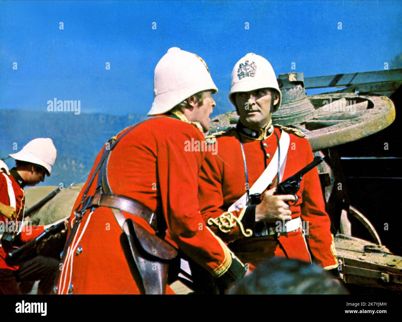Michael Caine & Stanley Baker Film: Zulu (1964) Characters: Lieutenant Gonville Bromhead & Lieutenant John Chard R.E.  Director: Cy Endfield 22 January 1964   **WARNING** This Photograph is for editorial use only and is the copyright of PARAMOUNT and/or the Photographer assigned by the Film or Production Company and can only be reproduced by publications in conjunction with the promotion of the above Film. A Mandatory Credit To PARAMOUNT is required. The Photographer should also be credited when known. No commercial use can be granted without written authority from the Film Company. Stock Photo