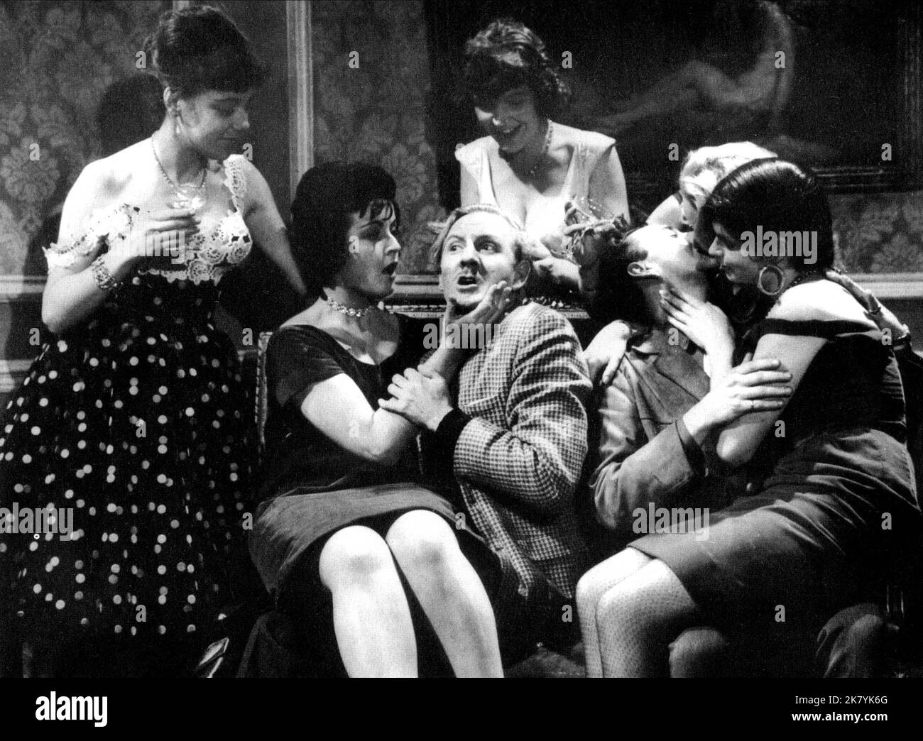 Leslie Phillips Film: A Weekend With Lulu (1961) Characters: Timothy Gray  Director: John Paddy Carstairs 10 April 1961   **WARNING** This Photograph is for editorial use only and is the copyright of HAMMER FILM and/or the Photographer assigned by the Film or Production Company and can only be reproduced by publications in conjunction with the promotion of the above Film. A Mandatory Credit To HAMMER FILM is required. The Photographer should also be credited when known. No commercial use can be granted without written authority from the Film Company. Stock Photo