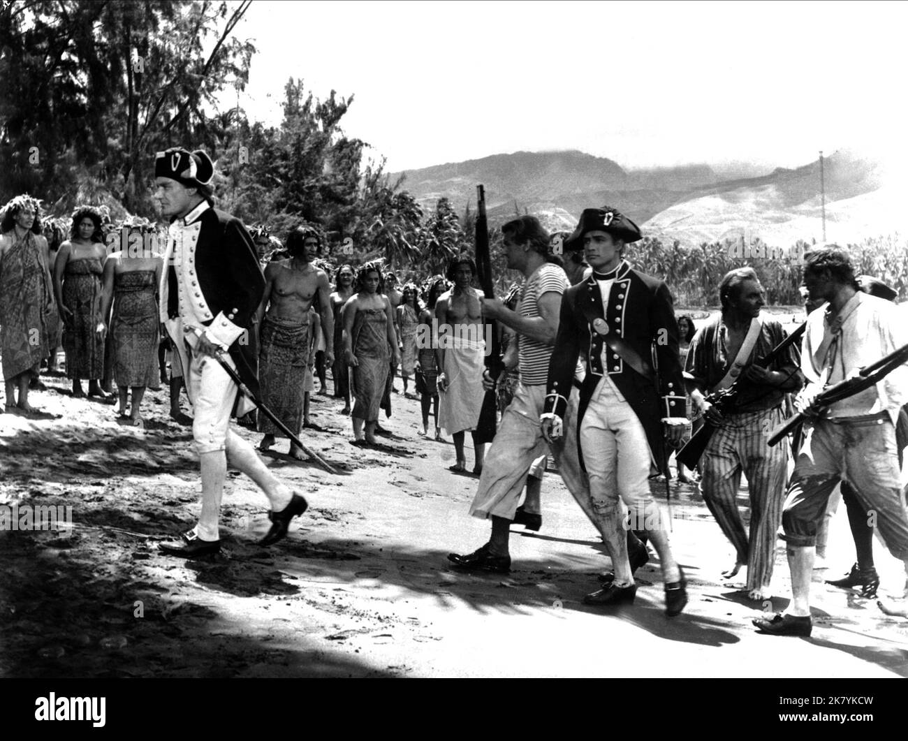 Marlon Brando & Trevor Howard Film: Mutiny On The Bounty (USA 1962) Characters: 1ST LT. FLETCHER CHRISTIAN, CAPT. WILLIAM BLIGH  Director: Lewis Milestone 08 November 1962   **WARNING** This Photograph is for editorial use only and is the copyright of MGM and/or the Photographer assigned by the Film or Production Company and can only be reproduced by publications in conjunction with the promotion of the above Film. A Mandatory Credit To MGM is required. The Photographer should also be credited when known. No commercial use can be granted without written authority from the Film Company. Stock Photo