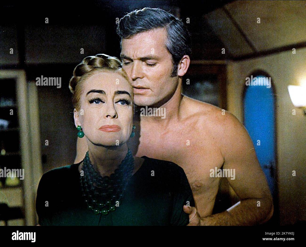 Joan Crawford & Ty Hardin Film: Berserk (1961) Characters: Monica Rivers, Frank Hawkins  Director: Jim O'Connolly 06 December 1967   **WARNING** This Photograph is for editorial use only and is the copyright of COLUMBIA PICTURES and/or the Photographer assigned by the Film or Production Company and can only be reproduced by publications in conjunction with the promotion of the above Film. A Mandatory Credit To COLUMBIA PICTURES is required. The Photographer should also be credited when known. No commercial use can be granted without written authority from the Film Company. Stock Photo