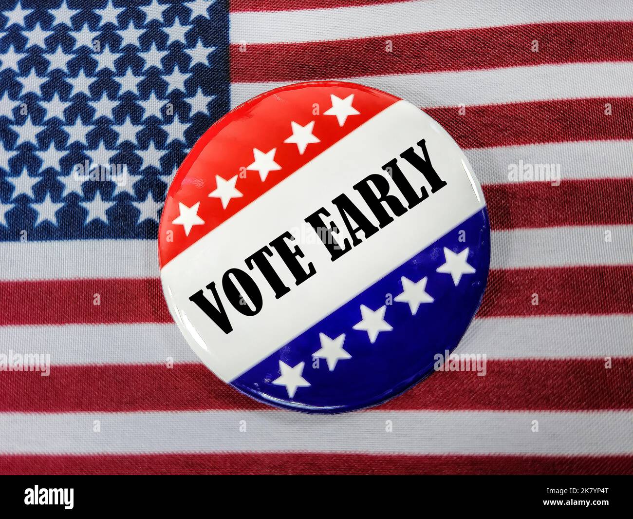Early voting election pin on an American flag Stock Photo