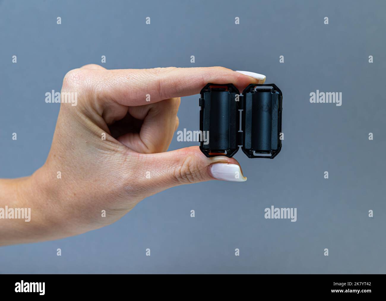 Man's hand close up opening a new Apple Inc brand USB-C 20 watt power  adapter with original packaging Stock Photo - Alamy