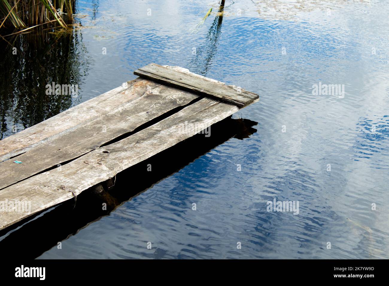 wooden pier in the lake. Stock Photo