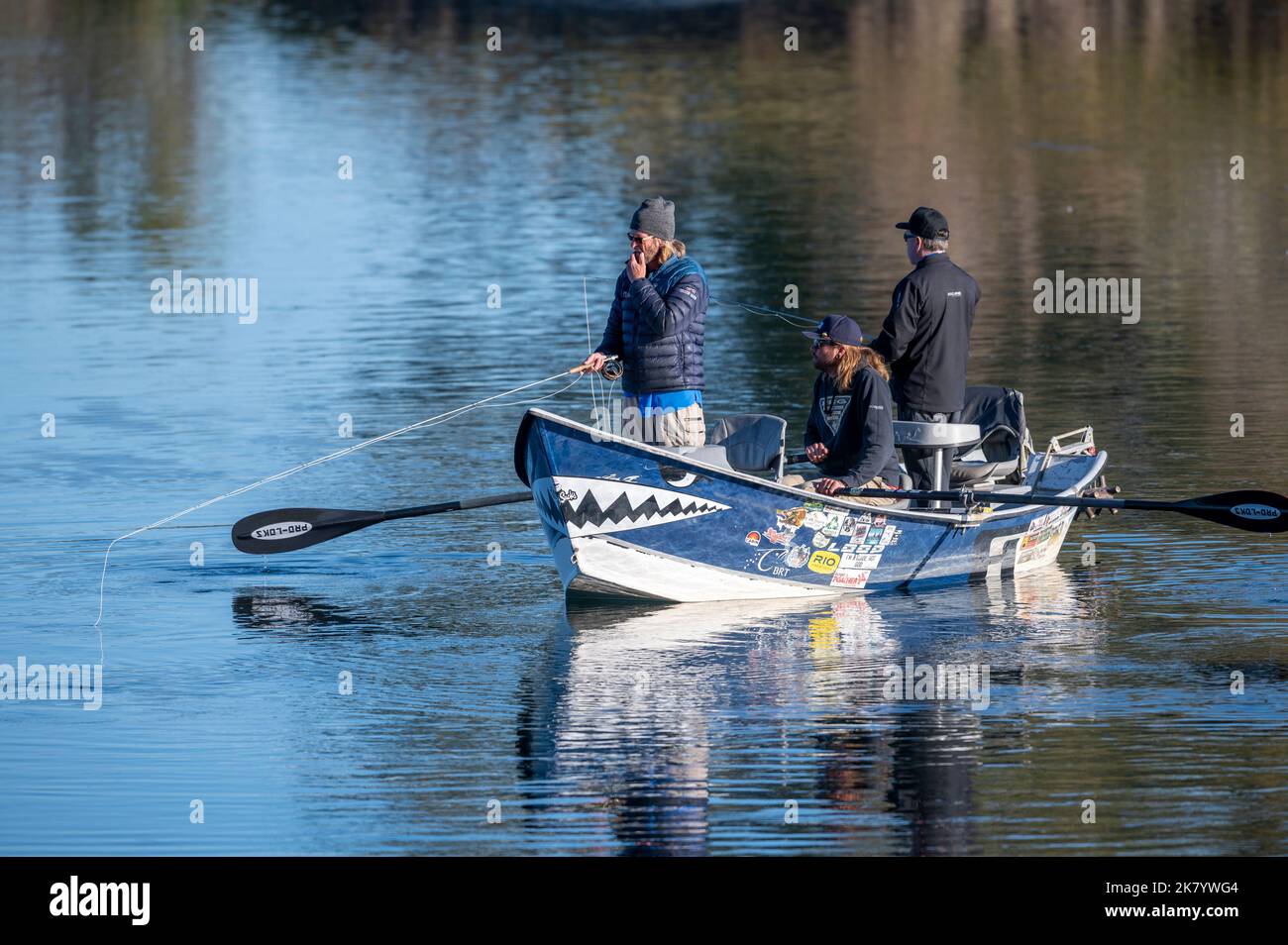 Fly fishermen with float boat on the Bow River, Carburn Park, Calgary, Alberta, Canada Stock Photo