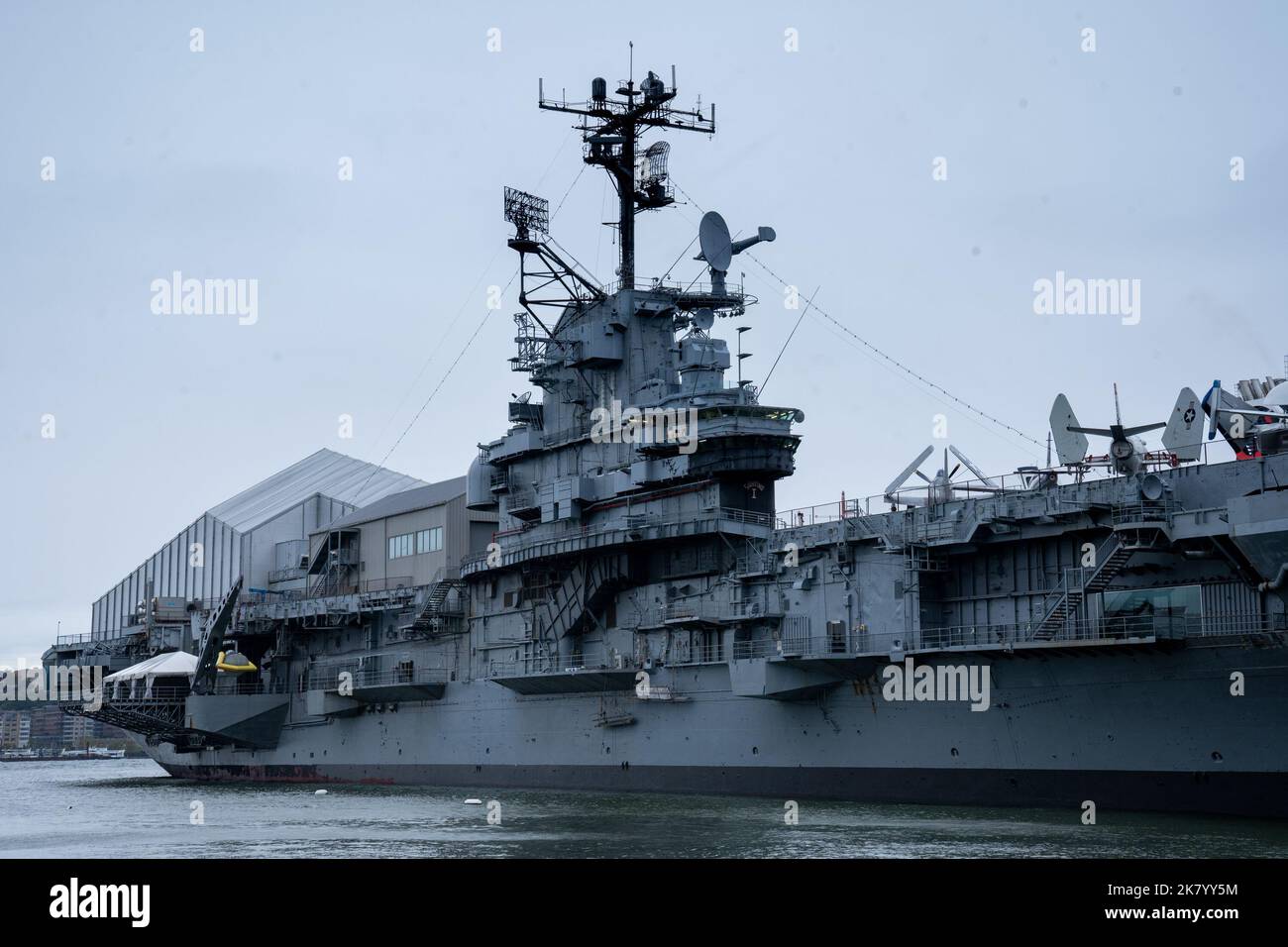 New York, NY - USA - Oct 2,2022 - Three quarter view of The Intrepid Sea, Air & Space Museum. An American military and maritime history museum in New Stock Photo