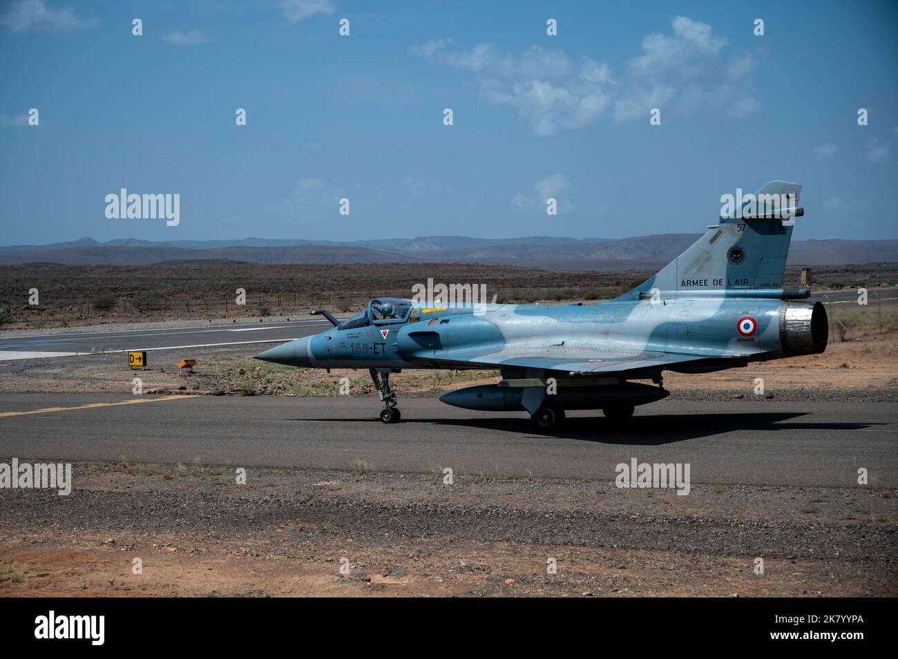 A French air force Dassault Mirage 2000 taxis on flightline at ...