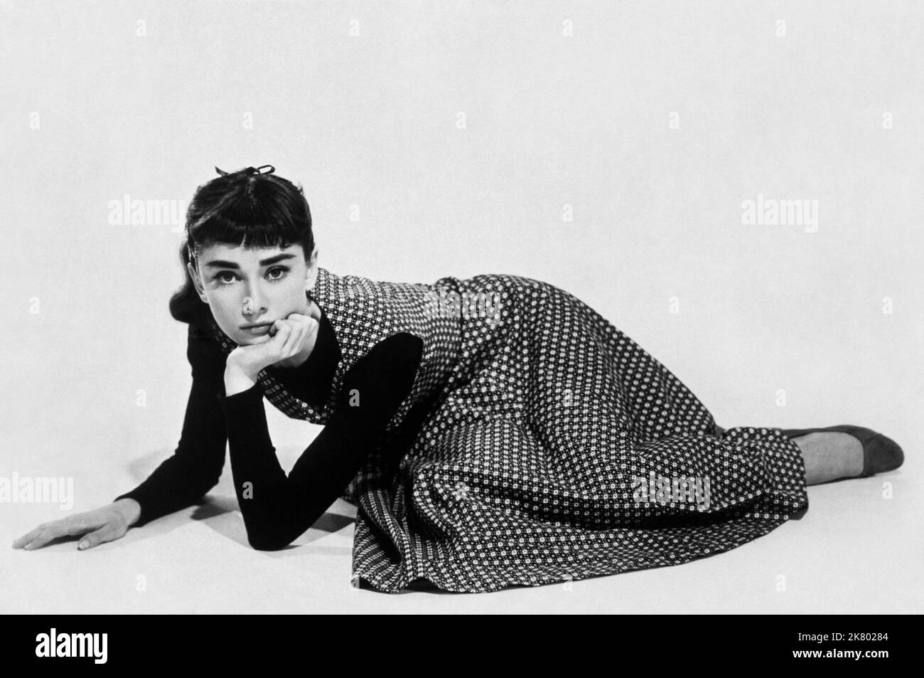 Audrey Hepburn Film: Sabrina; Sabrina Fair (USA 1954)   Director: Billy Wilder 03 September 1954   **WARNING** This Photograph is for editorial use only and is the copyright of PARAMOUNT PICTURES and/or the Photographer assigned by the Film or Production Company and can only be reproduced by publications in conjunction with the promotion of the above Film. A Mandatory Credit To PARAMOUNT PICTURES is required. The Photographer should also be credited when known. No commercial use can be granted without written authority from the Film Company. Stock Photo