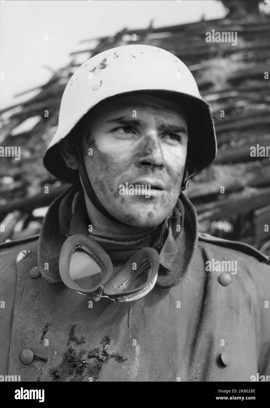 Joachim Fuchsberger Film: 08/15 Part 2 (GER 1955) Characters: Oberleutnant Heitzel Agen / Professor  (as Akim Berg)  Director: Paul May 15 August 1955   **WARNING** This Photograph is for editorial use only and is the copyright of TRANSOCEAN-FILM and/or the Photographer assigned by the Film or Production Company and can only be reproduced by publications in conjunction with the promotion of the above Film. A Mandatory Credit To TRANSOCEAN-FILM is required. The Photographer should also be credited when known. No commercial use can be granted without written authority from the Film Company. Stock Photo