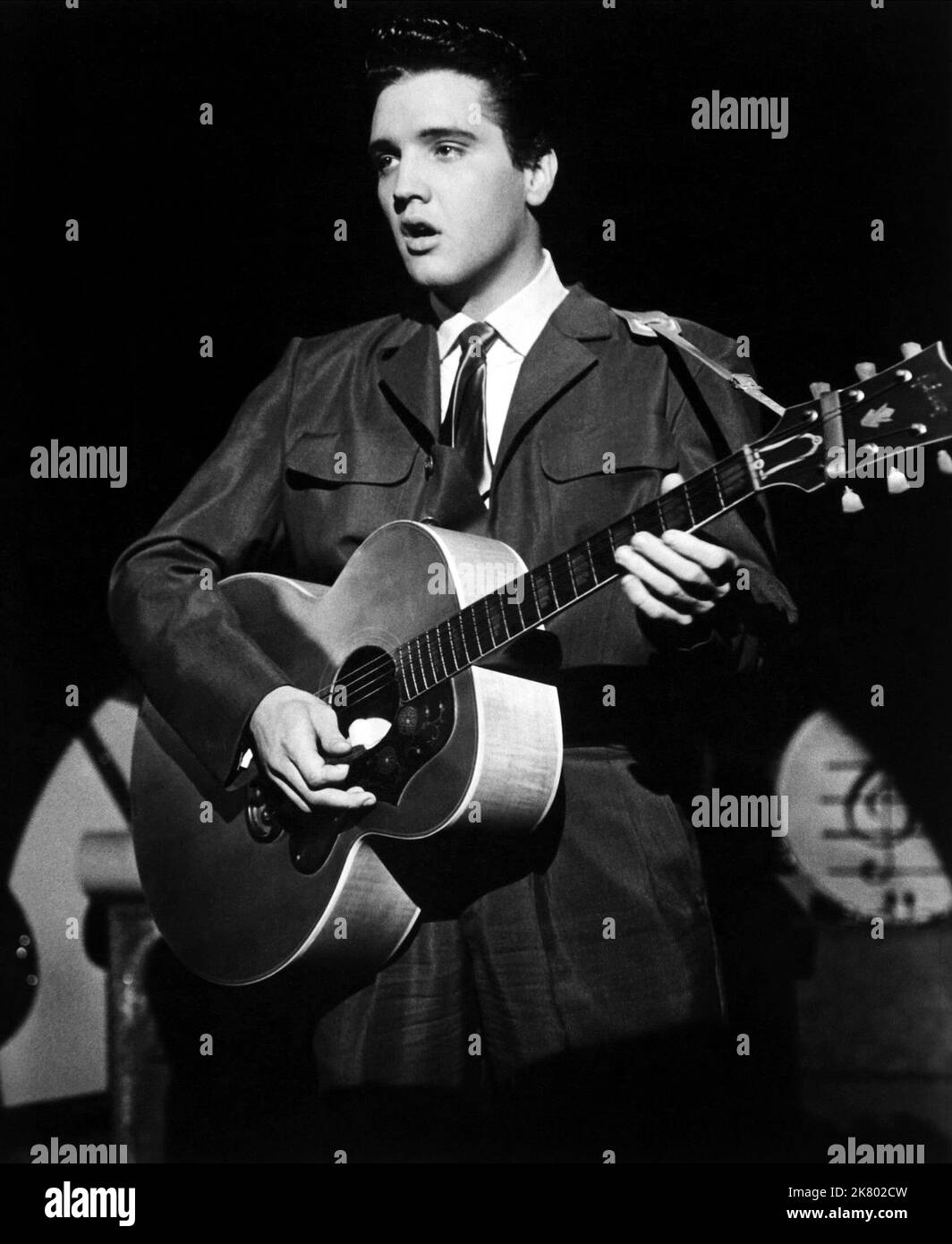Elvis Presley Film: King Creole (USA 1958) Characters: Danny Fisher  Director: Michael Curtiz 02 July 1958   **WARNING** This Photograph is for editorial use only and is the copyright of PARAMOUNT and/or the Photographer assigned by the Film or Production Company and can only be reproduced by publications in conjunction with the promotion of the above Film. A Mandatory Credit To PARAMOUNT is required. The Photographer should also be credited when known. No commercial use can be granted without written authority from the Film Company. Stock Photo