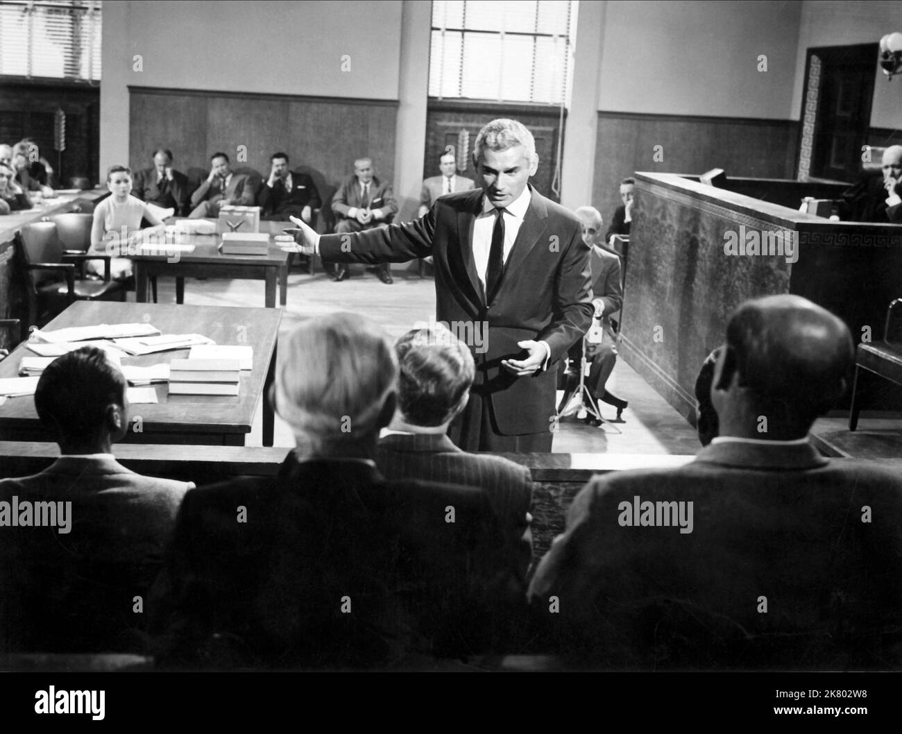Jeff Chandler  Film The Tattered Dress (1957) Characters: James Gordon Blane  Director: Jack Arnold 14 March 1957   **WARNING** This Photograph is for editorial use only and is the copyright of UNIVERSAL and/or the Photographer assigned by the  Film or Production Company and can only be reproduced by publications in conjunction with the promotion of the above  Film. A Mandatory Credit To UNIVERSAL is required. The Photographer should also be credited when known. No commercial use can be granted without written authority from the  Film Company. Stock Photo