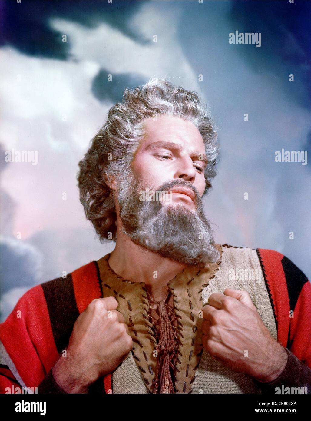 Charlton Heston Film: The Ten Commandments (1950) Characters: Moses  Director: Cecil B. Demille 05 October 1956   **WARNING** This Photograph is for editorial use only and is the copyright of UNIVERSAL and/or the Photographer assigned by the Film or Production Company and can only be reproduced by publications in conjunction with the promotion of the above Film. A Mandatory Credit To UNIVERSAL is required. The Photographer should also be credited when known. No commercial use can be granted without written authority from the Film Company. Stock Photo