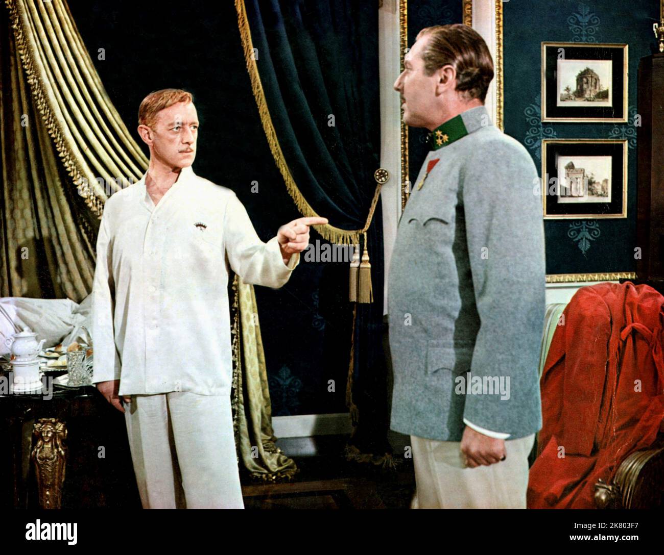 Alec Guinness Film: The Swan (USA 1956) Characters: WITH  Director: Charles Vidor 18 April 1956   **WARNING** This Photograph is for editorial use only and is the copyright of MGM and/or the Photographer assigned by the Film or Production Company and can only be reproduced by publications in conjunction with the promotion of the above Film. A Mandatory Credit To MGM is required. The Photographer should also be credited when known. No commercial use can be granted without written authority from the Film Company. Stock Photo