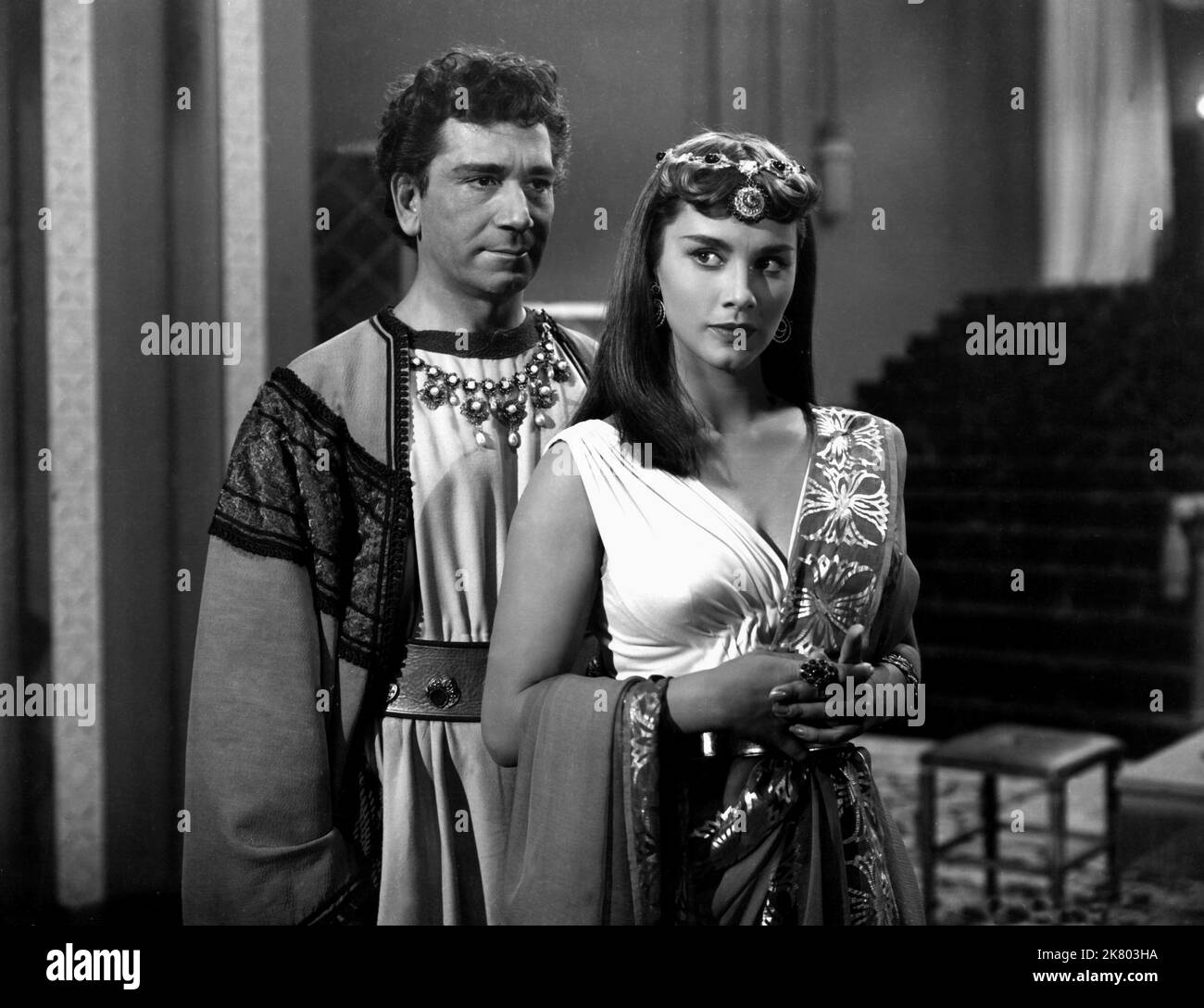 Richard Conte & Linda Christian Film: Slaves Of Babylon (1953) Characters: Nahum & Princess Panthea  Director: William Castle 01 October 1953   **WARNING** This Photograph is for editorial use only and is the copyright of COLUMBIA and/or the Photographer assigned by the Film or Production Company and can only be reproduced by publications in conjunction with the promotion of the above Film. A Mandatory Credit To COLUMBIA is required. The Photographer should also be credited when known. No commercial use can be granted without written authority from the Film Company. Stock Photo