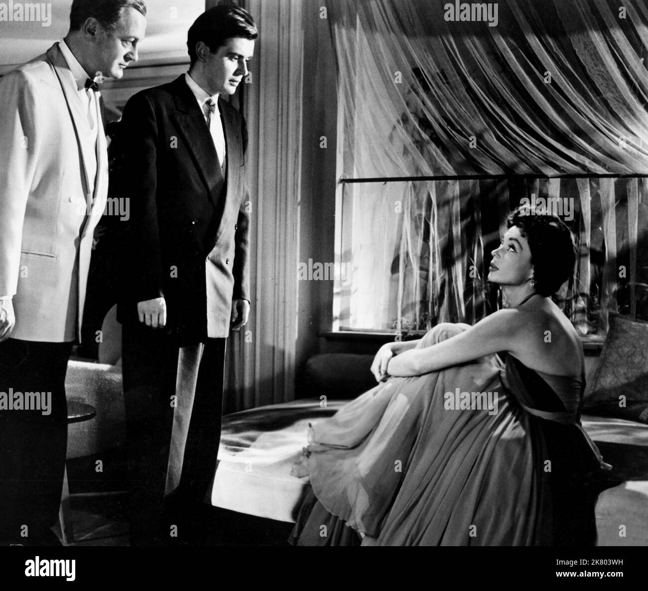 Curd Jurgens, Paul Bosiger & Lilli Palmer Film: Devil In Silk (1955) Characters: , & Melanie  Director: Rolf Hansen 05 January 1956   **WARNING** This Photograph is for editorial use only and is the copyright of NULL and/or the Photographer assigned by the Film or Production Company and can only be reproduced by publications in conjunction with the promotion of the above Film. A Mandatory Credit To NULL is required. The Photographer should also be credited when known. No commercial use can be granted without written authority from the Film Company. Stock Photo
