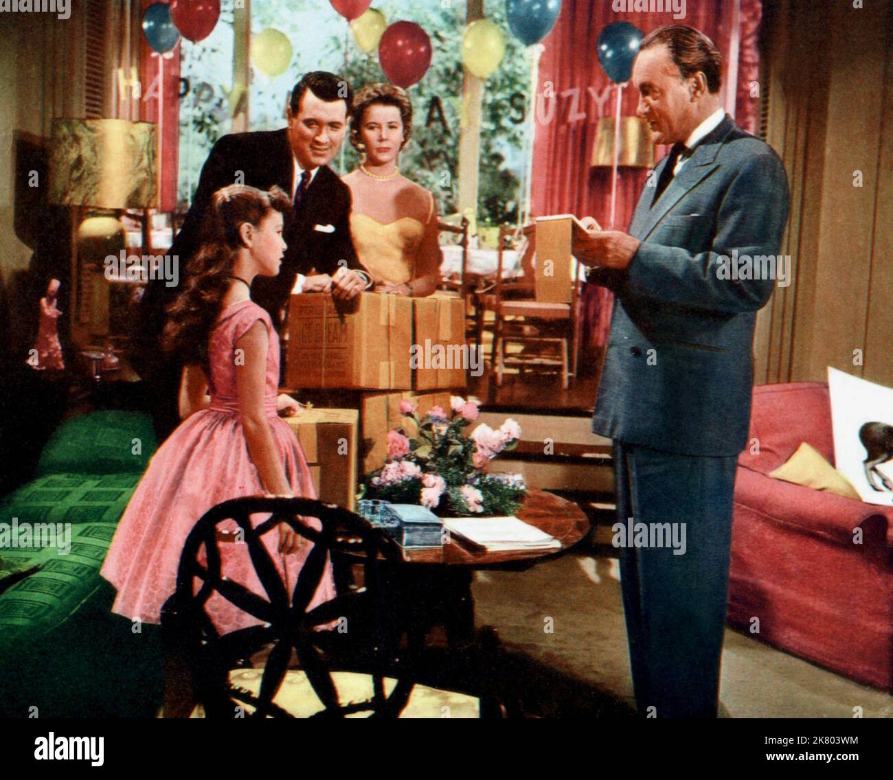 Shelley Fabares, Rock Hudson, Cornell Borchers & George Sanders Film: Never Say Goodbye (1956) Characters: Suzy Parker,Dr. Michael Parker,Lisa Gosting & Victor  Director: Jerry Hopper 10 March 1956   **WARNING** This Photograph is for editorial use only and is the copyright of UNIVERSAL and/or the Photographer assigned by the Film or Production Company and can only be reproduced by publications in conjunction with the promotion of the above Film. A Mandatory Credit To UNIVERSAL is required. The Photographer should also be credited when known. No commercial use can be granted without written au Stock Photo
