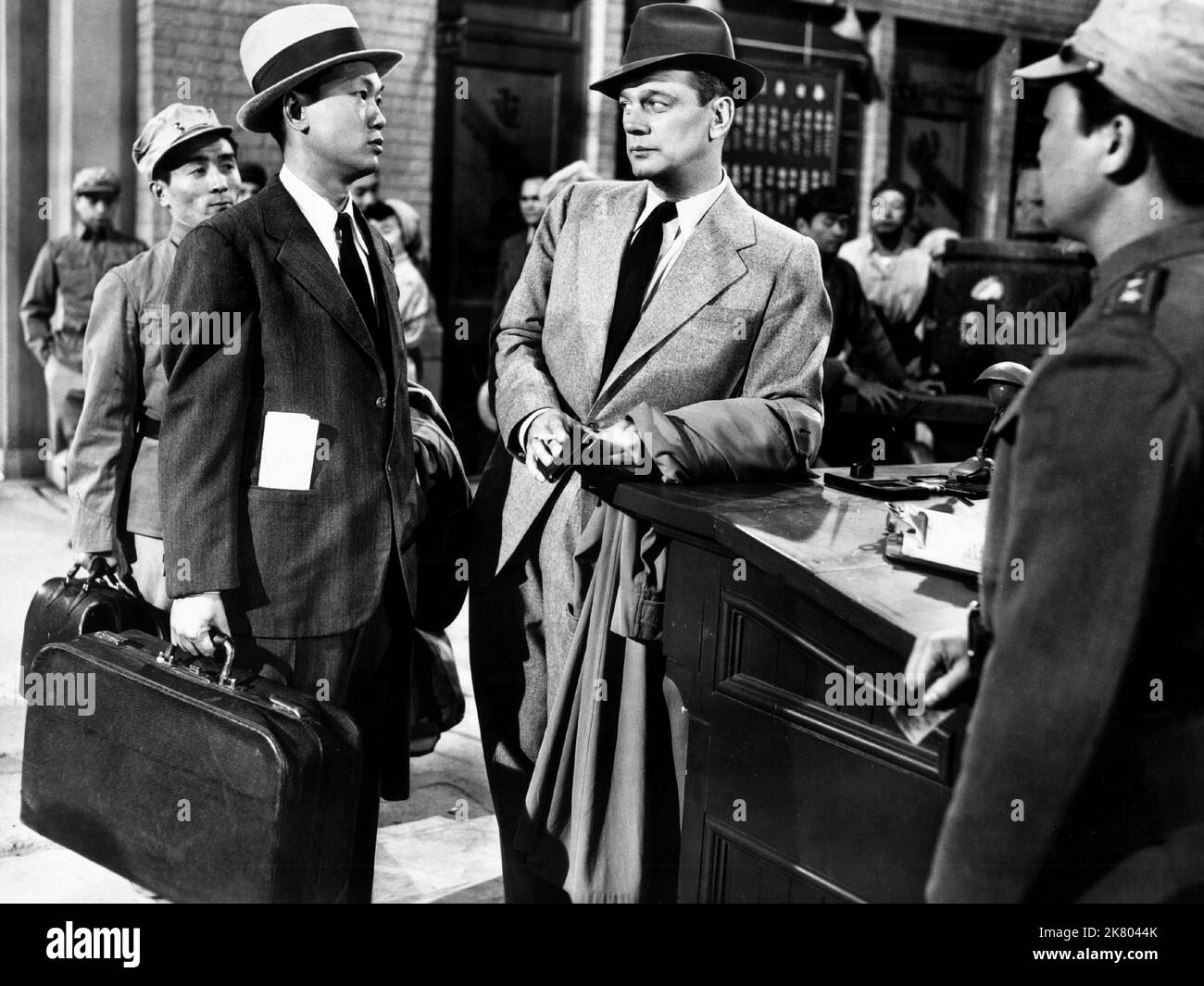 Benson Fong & Joseph Cotten Film: Peking Express (1958) Characters: Wong & Michael Bachlin  Director: William Dieterle 18 July 1951   **WARNING** This Photograph is for editorial use only and is the copyright of PARAMOUNT PICTURES and/or the Photographer assigned by the Film or Production Company and can only be reproduced by publications in conjunction with the promotion of the above Film. A Mandatory Credit To PARAMOUNT PICTURES is required. The Photographer should also be credited when known. No commercial use can be granted without written authority from the Film Company. Stock Photo