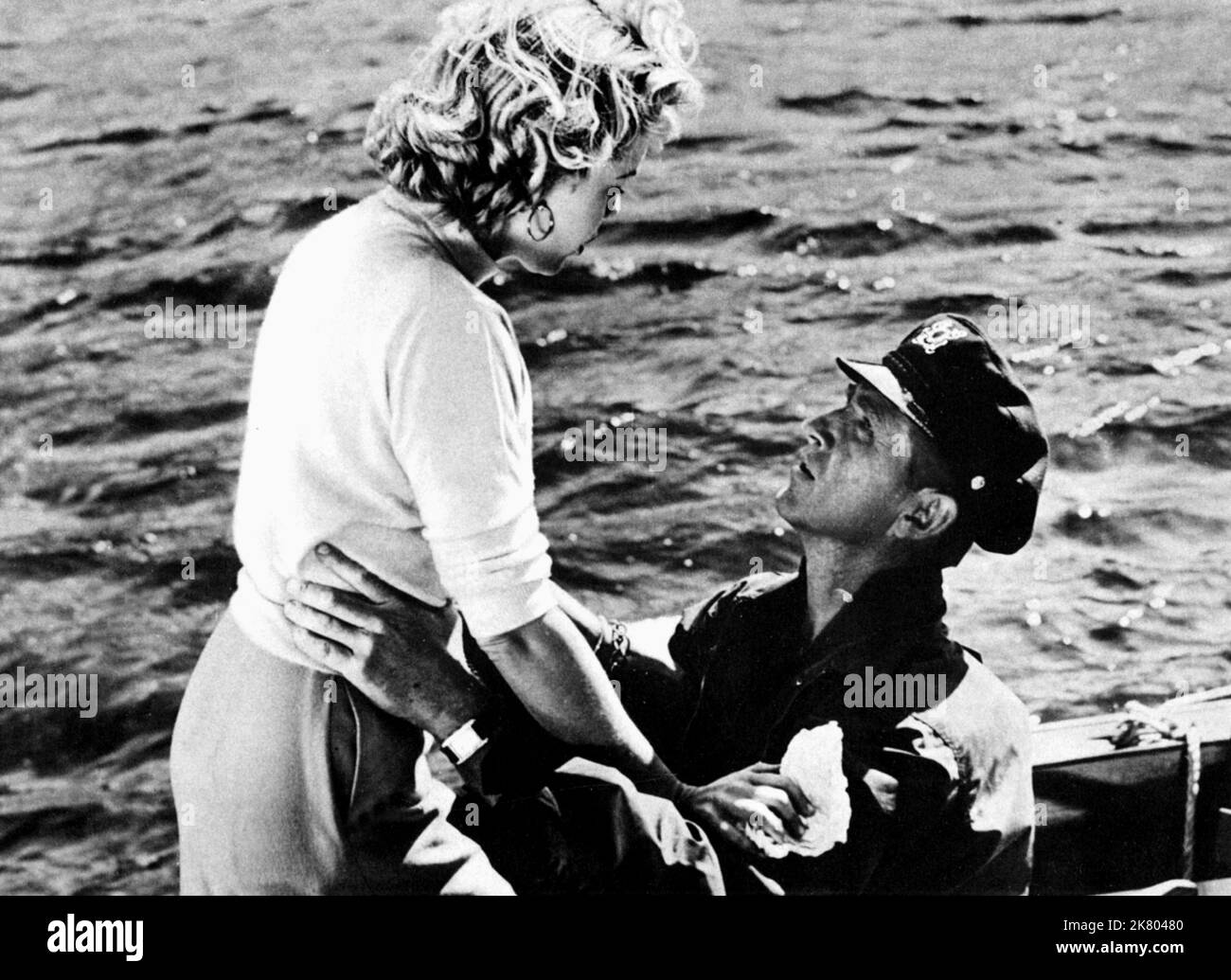 Nancy Gates & Lloyd Bridges Film: Wetbacks (1956) Characters: Sally Parker & Jim Benson  Director: Hank Mccune 04 May 1956   **WARNING** This Photograph is for editorial use only and is the copyright of BANNER ENT. and/or the Photographer assigned by the Film or Production Company and can only be reproduced by publications in conjunction with the promotion of the above Film. A Mandatory Credit To BANNER ENT. is required. The Photographer should also be credited when known. No commercial use can be granted without written authority from the Film Company. Stock Photo
