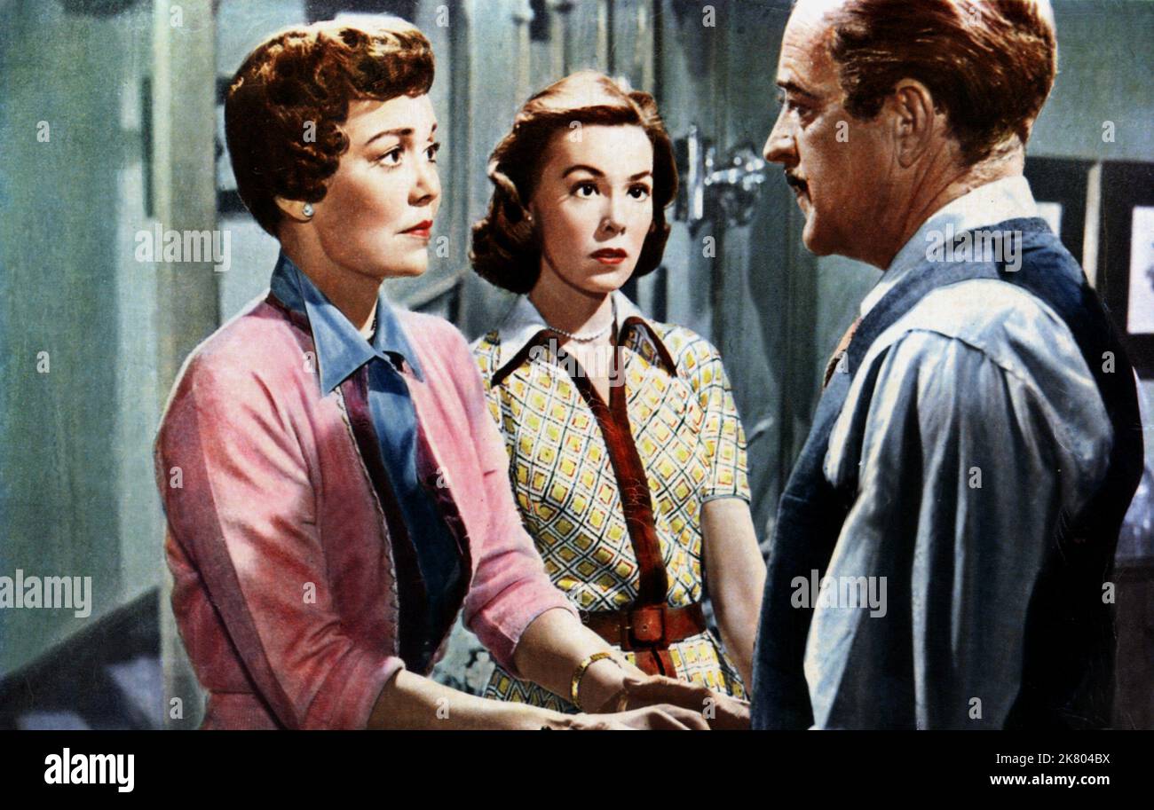 Jane Wyman, Barbara Rush & Otto Kruger Film: Magnificent Obsession (1959) Characters: Helen Phillips,Joyce Phillips & Edward Randolph  Director: Douglas Sirk 04 August 1954   **WARNING** This Photograph is for editorial use only and is the copyright of UI and/or the Photographer assigned by the Film or Production Company and can only be reproduced by publications in conjunction with the promotion of the above Film. A Mandatory Credit To UI is required. The Photographer should also be credited when known. No commercial use can be granted without written authority from the Film Company. Stock Photo