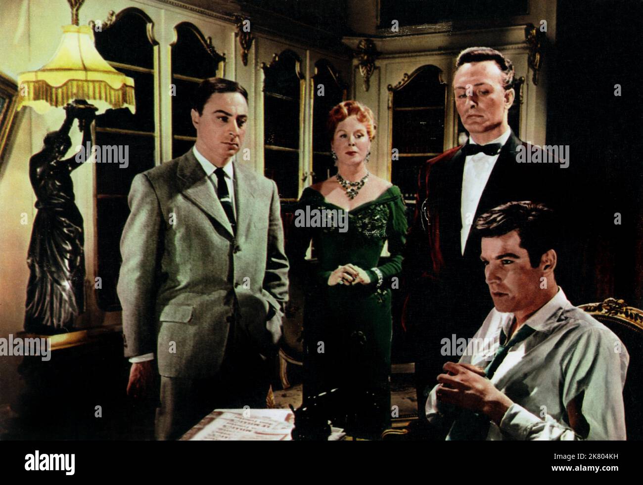 Gerard Oury, Brenda De Banzie, Anton Diffring & Michael Craig Film: House Of Secrets (1956) Characters: ,Mme. Isabella Ballu,Anton Luaderbach & Larry Ellis / Steve Chancellor (dec.)  Director: Guy Green 23 October 1956   **WARNING** This Photograph is for editorial use only and is the copyright of RANK and/or the Photographer assigned by the Film or Production Company and can only be reproduced by publications in conjunction with the promotion of the above Film. A Mandatory Credit To RANK is required. The Photographer should also be credited when known. No commercial use can be granted without Stock Photo