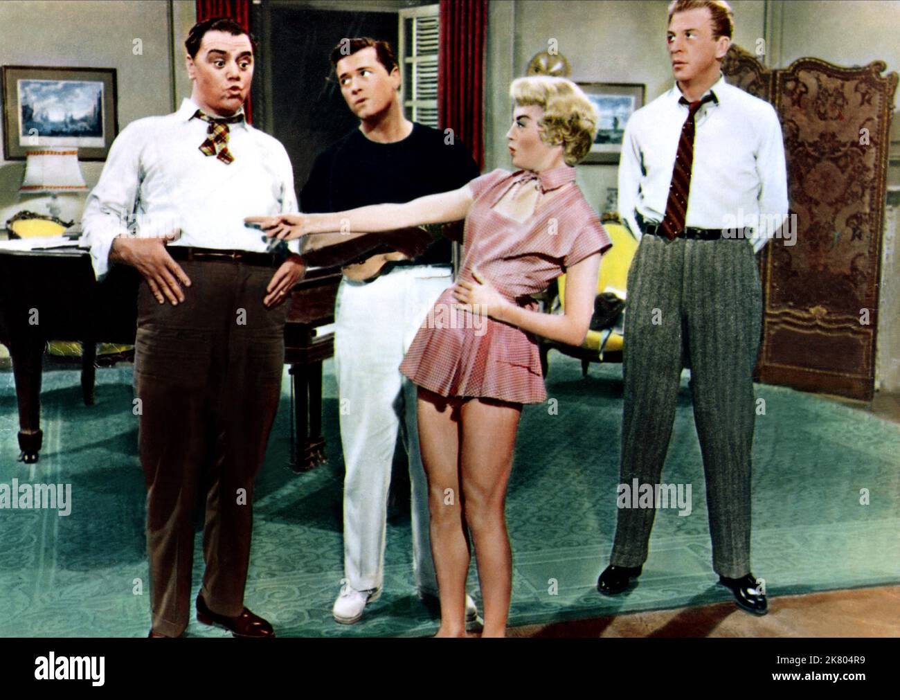 Ernest Borgnine, Tommy Noonan, Sheree North & Dan Dailey Film: The Best Things In Life Are Free (1956) Characters: Lew Brown,Carl Frisbee,Kitty Kane & Ray Henderson  Director: Michael Curtiz 28 September 1956   **WARNING** This Photograph is for editorial use only and is the copyright of 20TH CENTURY FOX and/or the Photographer assigned by the Film or Production Company and can only be reproduced by publications in conjunction with the promotion of the above Film. A Mandatory Credit To 20TH CENTURY FOX is required. The Photographer should also be credited when known. No commercial use can be g Stock Photo