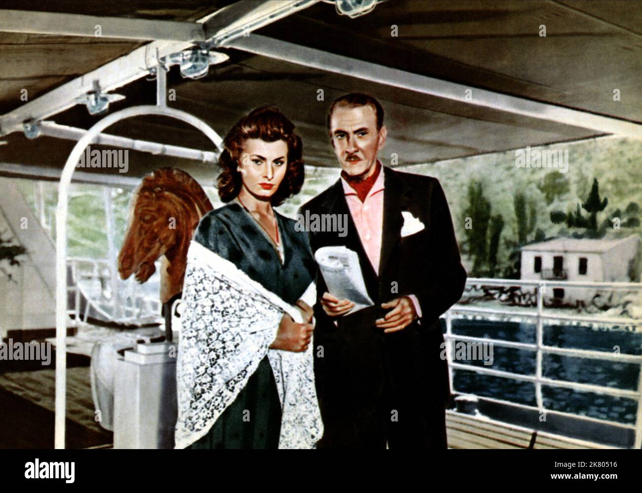 Sophia Loren & Clifton Webb Film: Boy On A Dolphin (USA 1957) Characters: Phaedra & Victor Parmalee  Director: Jean Negulesco 19 April 1957   **WARNING** This Photograph is for editorial use only and is the copyright of 20 CENTURY FOX and/or the Photographer assigned by the Film or Production Company and can only be reproduced by publications in conjunction with the promotion of the above Film. A Mandatory Credit To 20 CENTURY FOX is required. The Photographer should also be credited when known. No commercial use can be granted without written authority from the Film Company. Stock Photo