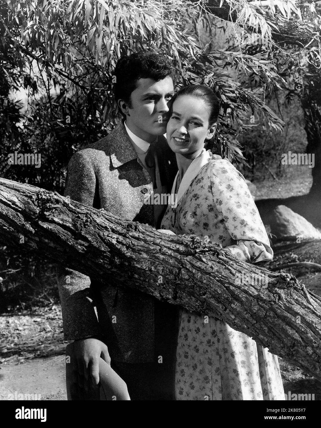 James Darren & Kathryn Grant Film: Gunman'S Walk (USA 1958) Characters: Davy Hackett & Clee Chouard  Director: Phil Karlson 01 July 1958   **WARNING** This Photograph is for editorial use only and is the copyright of COLUMBIA PICTURES and/or the Photographer assigned by the Film or Production Company and can only be reproduced by publications in conjunction with the promotion of the above Film. A Mandatory Credit To COLUMBIA PICTURES is required. The Photographer should also be credited when known. No commercial use can be granted without written authority from the Film Company. Stock Photo