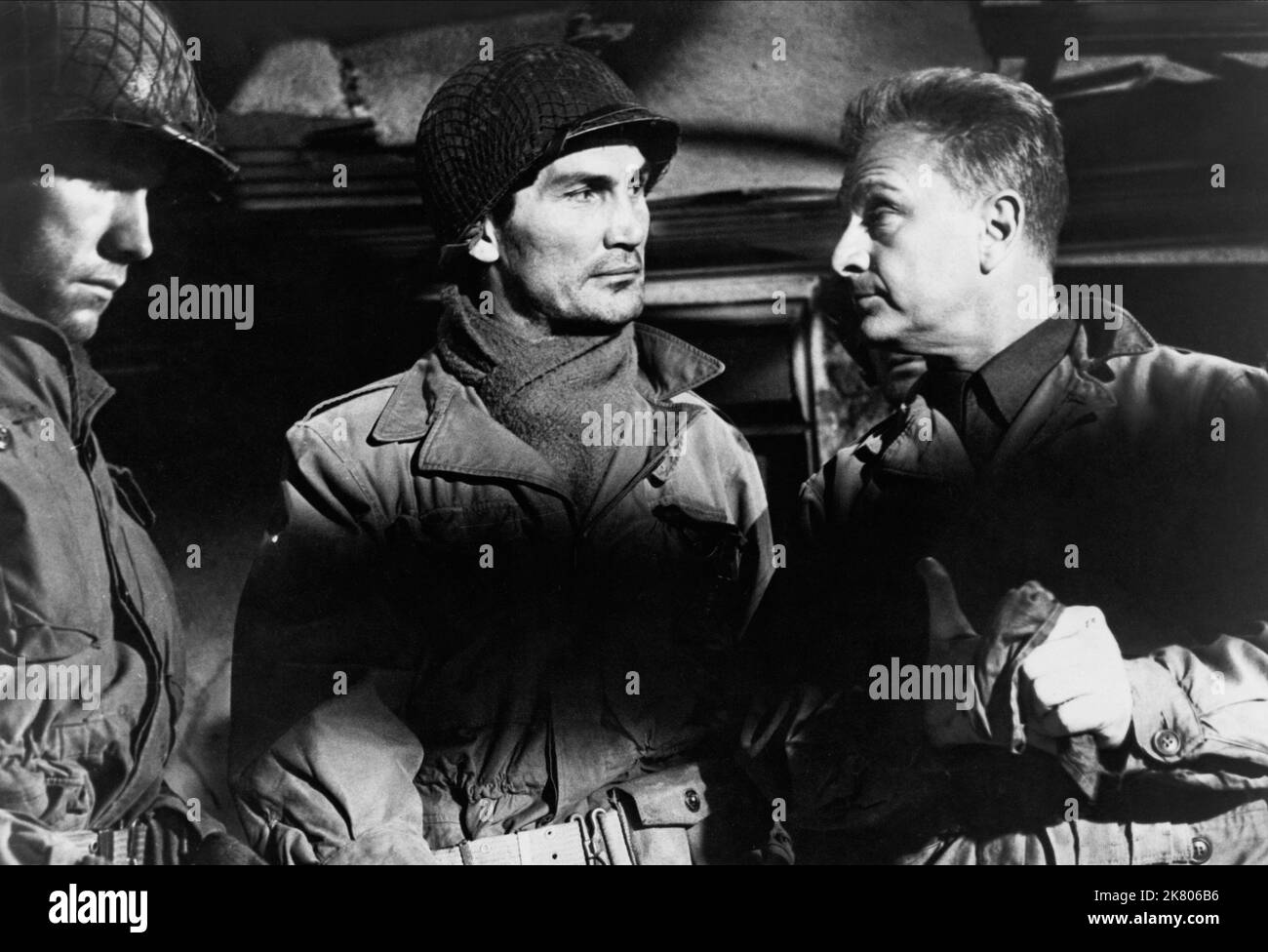 Jack Palance & Eddie Albert Film: Attack; Attack! (USA 1956) Characters: Lt. Joe Costa, Fox Co., Capt. Erskine Cooney, CO, Fox Co.  Director: Robert Aldrich 19 September 1956   **WARNING** This Photograph is for editorial use only and is the copyright of UNITED ARTISTS and/or the Photographer assigned by the Film or Production Company and can only be reproduced by publications in conjunction with the promotion of the above Film. A Mandatory Credit To UNITED ARTISTS is required. The Photographer should also be credited when known. No commercial use can be granted without written authority from Stock Photo