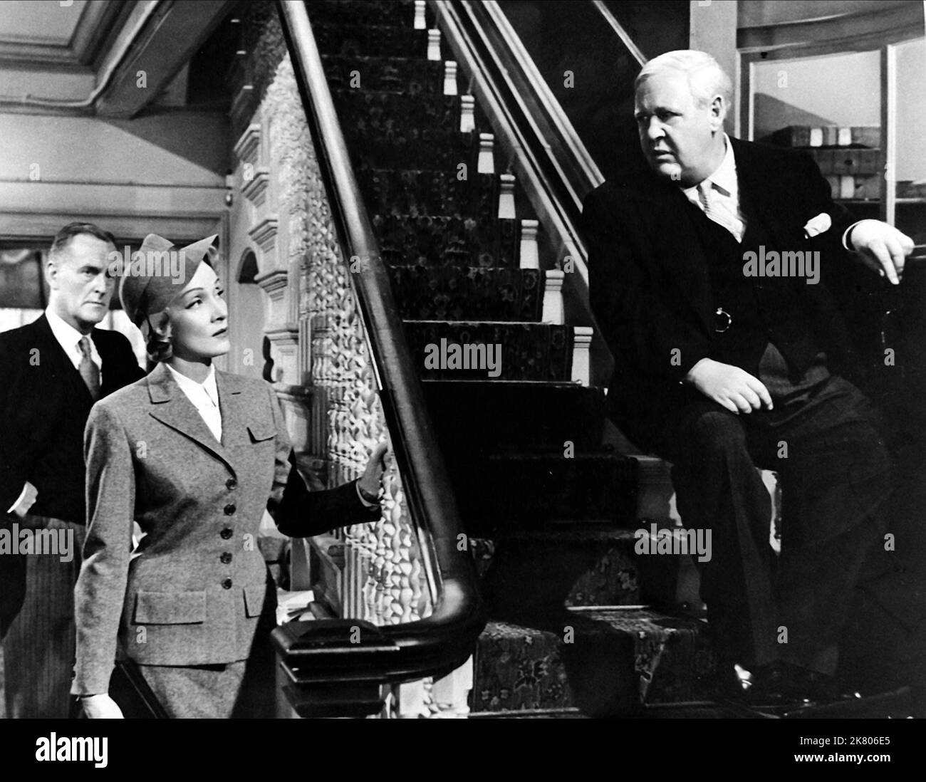 John Williams, Marlene Dietrich & Charles Laughton Film: Witness For The Prosecution (USA 1957) Characters: Brogan-Moore, Christine Vole, Sir Wilfrid Robarts  Director: Billy Wilder 17 December 1957   **WARNING** This Photograph is for editorial use only and is the copyright of MGM and/or the Photographer assigned by the Film or Production Company and can only be reproduced by publications in conjunction with the promotion of the above Film. A Mandatory Credit To MGM is required. The Photographer should also be credited when known. No commercial use can be granted without written authority fro Stock Photo