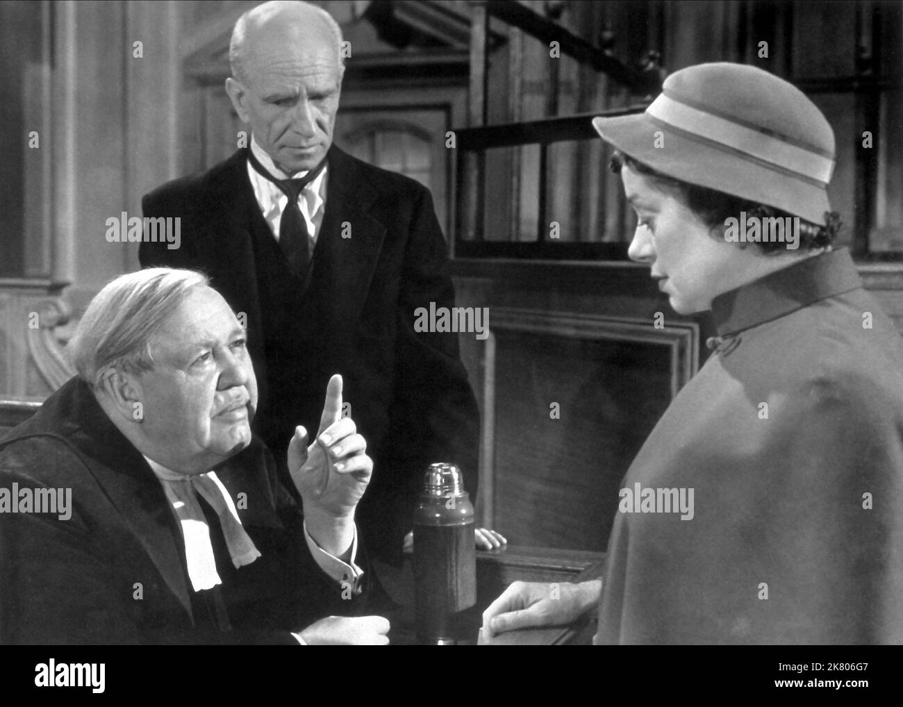 Charles Laughton, Ian Wolfe & Elsa Lanchester Film: Witness For The Prosecution (USA 1957) Characters: Sir Wilfrid Robarts, Carter, Miss Plimsoll  Director: Billy Wilder 17 December 1957   **WARNING** This Photograph is for editorial use only and is the copyright of MGM and/or the Photographer assigned by the Film or Production Company and can only be reproduced by publications in conjunction with the promotion of the above Film. A Mandatory Credit To MGM is required. The Photographer should also be credited when known. No commercial use can be granted without written authority from the Film C Stock Photo