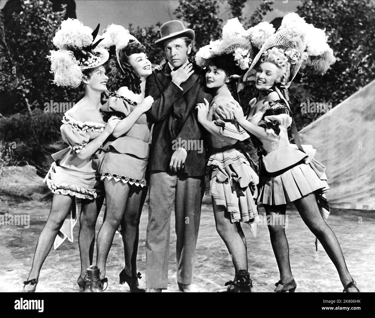 Joyce Mackenzie, Marion Marshall, Dan Dailey, Barbara Smith & Marilyn Monroe Film: A Ticket To Tomahawk (1950) Characters: Ruby (uncredited), Annie (uncredited), Johnny Behind-the-Deuces, Julie (uncredited), Clara (uncredited)  Director: Richard Sale 19 May 1950   **WARNING** This Photograph is for editorial use only and is the copyright of The Film Company and/or the Photographer assigned by the Film or Production Company and can only be reproduced by publications in conjunction with the promotion of the above Film. A Mandatory Credit To The Film Company is required. The Photographer should a Stock Photo
