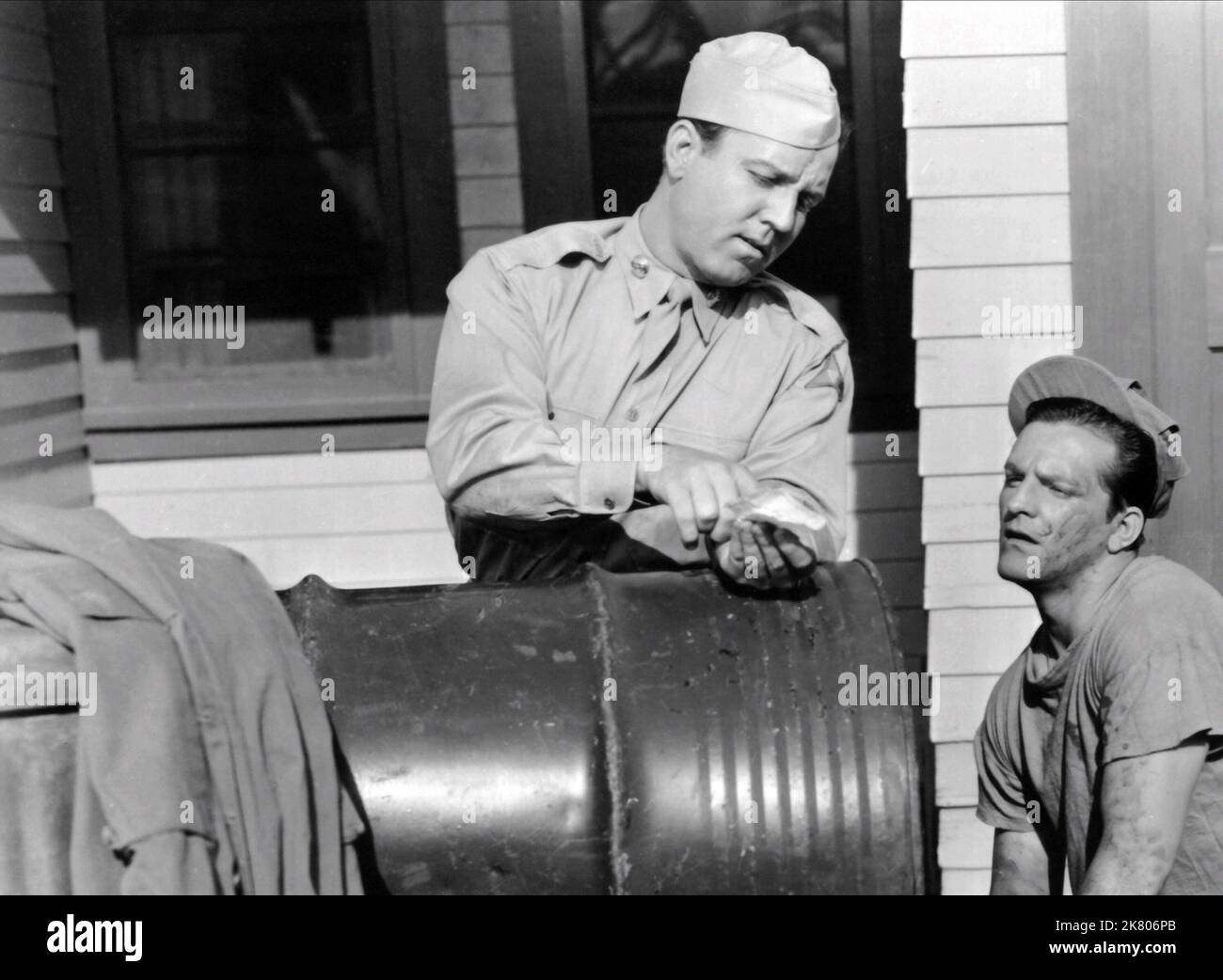 Steve Brodie & Stanley Clements Film: Army Bound (1952) Characters: Matt Hall, Frank Cermak  Director: Paul Landres 05 October 1952   **WARNING** This Photograph is for editorial use only and is the copyright of MONOGRAM PICTURES and/or the Photographer assigned by the Film or Production Company and can only be reproduced by publications in conjunction with the promotion of the above Film. A Mandatory Credit To MONOGRAM PICTURES is required. The Photographer should also be credited when known. No commercial use can be granted without written authority from the Film Company. Stock Photo