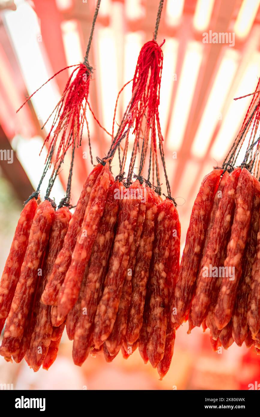 Bunches of traditional Chinese sausages on disolay for sale in Wan Chai Market, Hong Kong Island Stock Photo