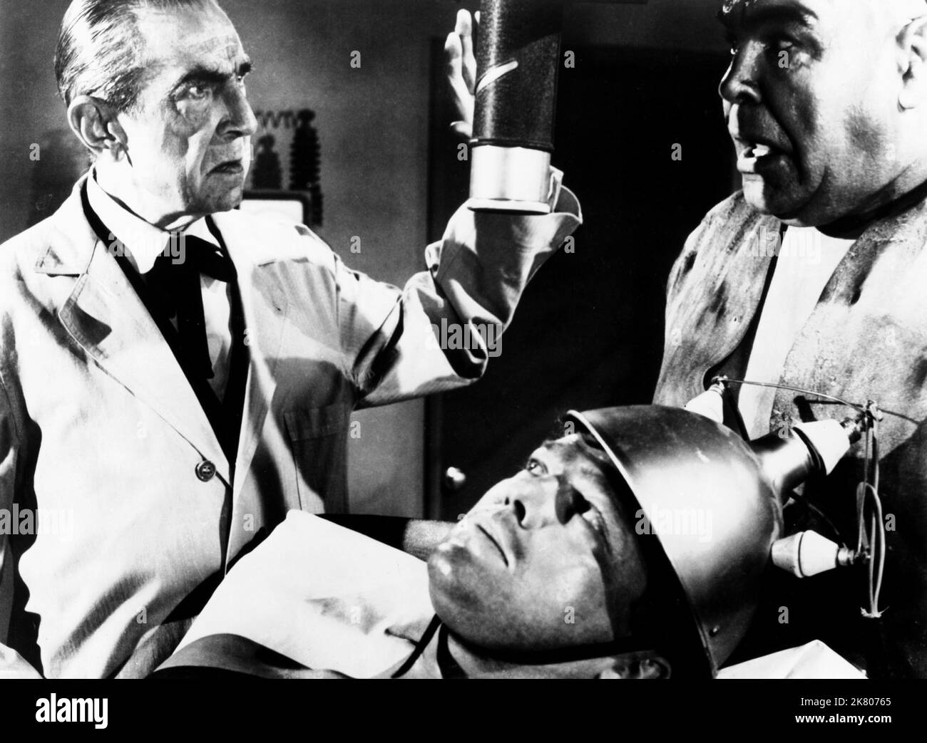 Bela Lugosi & Tor Johnson Film: Bride Of The Monster (1955) Characters: Dr. Eric Vornoff, Lobo  Director: Edward D. Wood Jr. 11 May 1955   **WARNING** This Photograph is for editorial use only and is the copyright of IMAGE ENT. and/or the Photographer assigned by the Film or Production Company and can only be reproduced by publications in conjunction with the promotion of the above Film. A Mandatory Credit To IMAGE ENT. is required. The Photographer should also be credited when known. No commercial use can be granted without written authority from the Film Company. Stock Photo