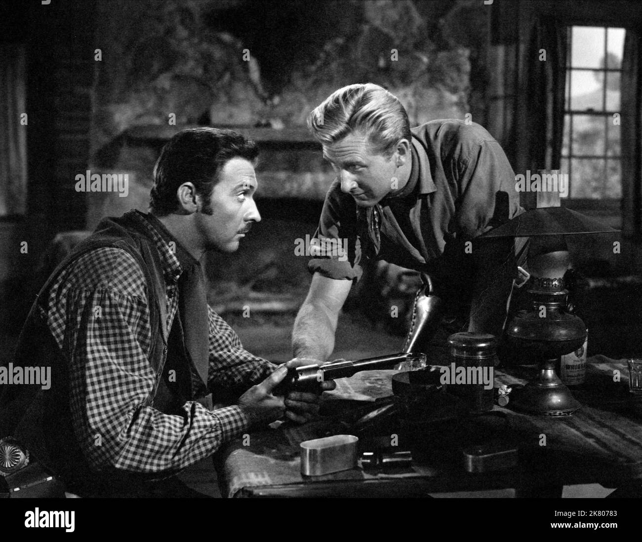 Randolph Scott & Lloyd Bridges Film: Colt .45 (1951) Characters: Steve Farrell, Paul Donovan  Director: Edwin L. Marin 27 May 1950   **WARNING** This Photograph is for editorial use only and is the copyright of WARNER BROS and/or the Photographer assigned by the Film or Production Company and can only be reproduced by publications in conjunction with the promotion of the above Film. A Mandatory Credit To WARNER BROS is required. The Photographer should also be credited when known. No commercial use can be granted without written authority from the Film Company. Stock Photo