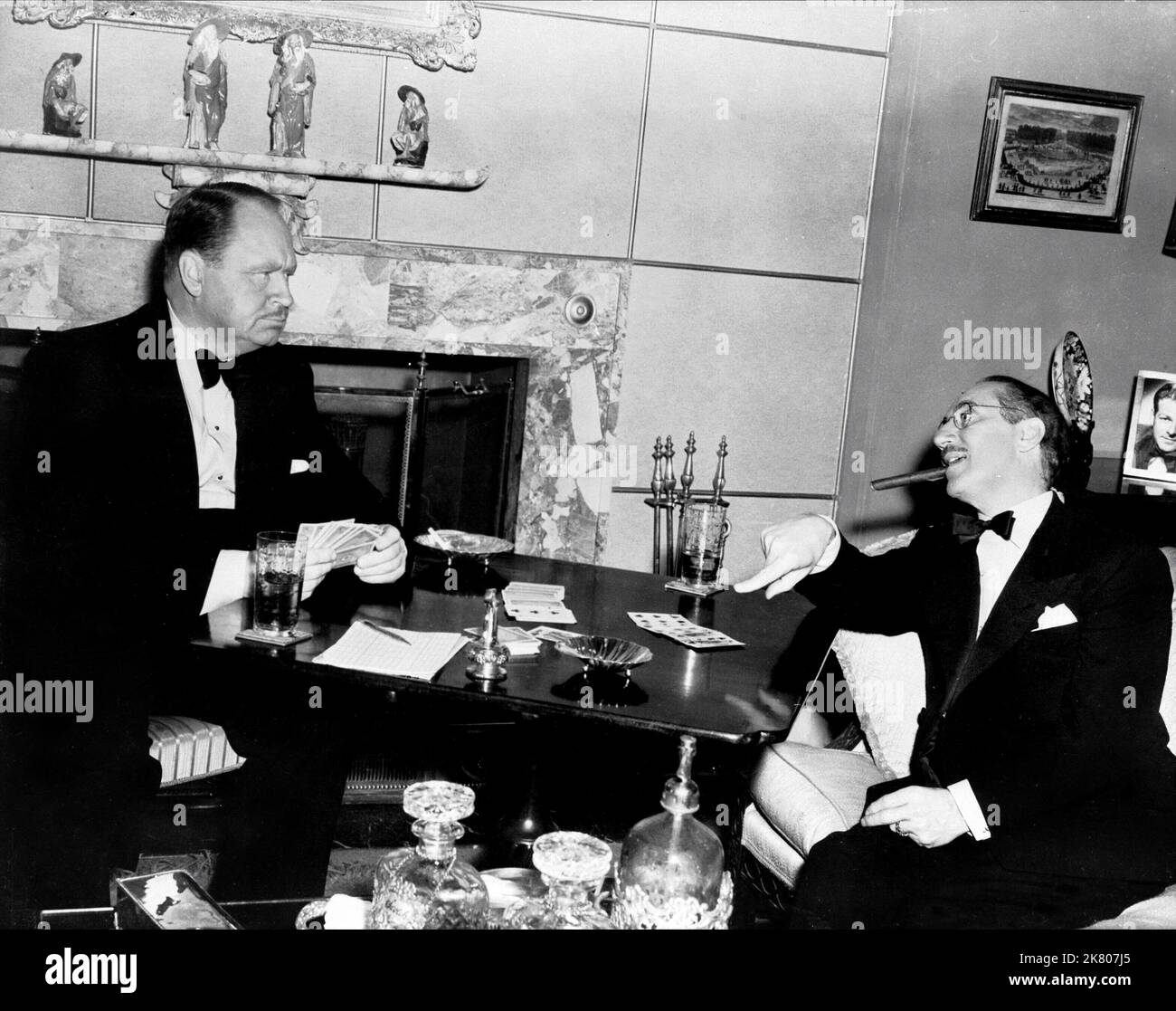 Howard Freeman & Groucho Marx Film: Double Dynamite (1951) Characters: R.B. Pulsifer Sr., Emile J. Keck  Director: Irving Cummings 25 December 1951   **WARNING** This Photograph is for editorial use only and is the copyright of RKO and/or the Photographer assigned by the Film or Production Company and can only be reproduced by publications in conjunction with the promotion of the above Film. A Mandatory Credit To RKO is required. The Photographer should also be credited when known. No commercial use can be granted without written authority from the Film Company. Stock Photo