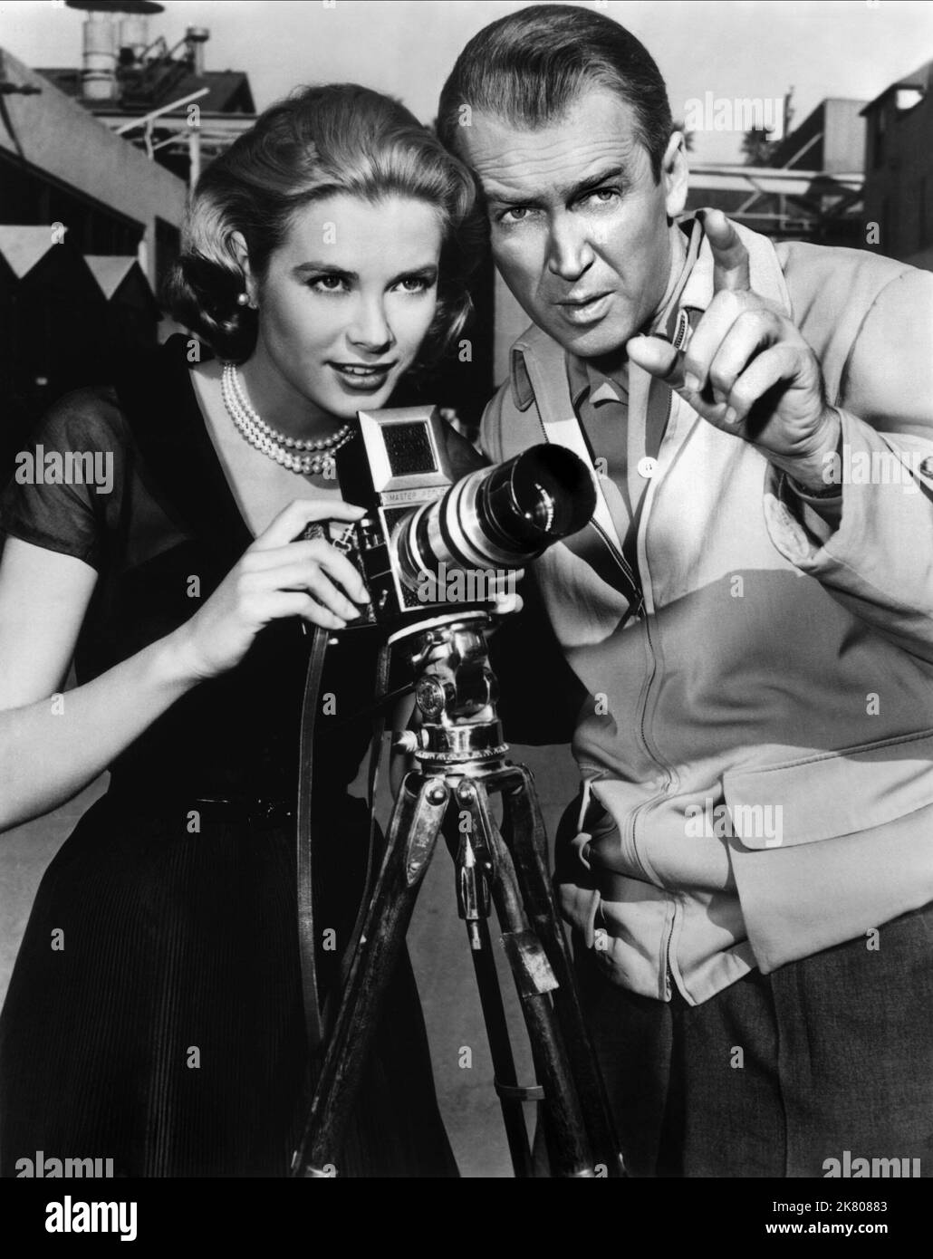 Grace Kelly & James Stewart Film: Rear Window (USA 1954)   Director: Alfred Hitchcock 04 August 1954   **WARNING** This Photograph is for editorial use only and is the copyright of PARAMOUNT and/or the Photographer assigned by the Film or Production Company and can only be reproduced by publications in conjunction with the promotion of the above Film. A Mandatory Credit To PARAMOUNT is required. The Photographer should also be credited when known. No commercial use can be granted without written authority from the Film Company. Stock Photo