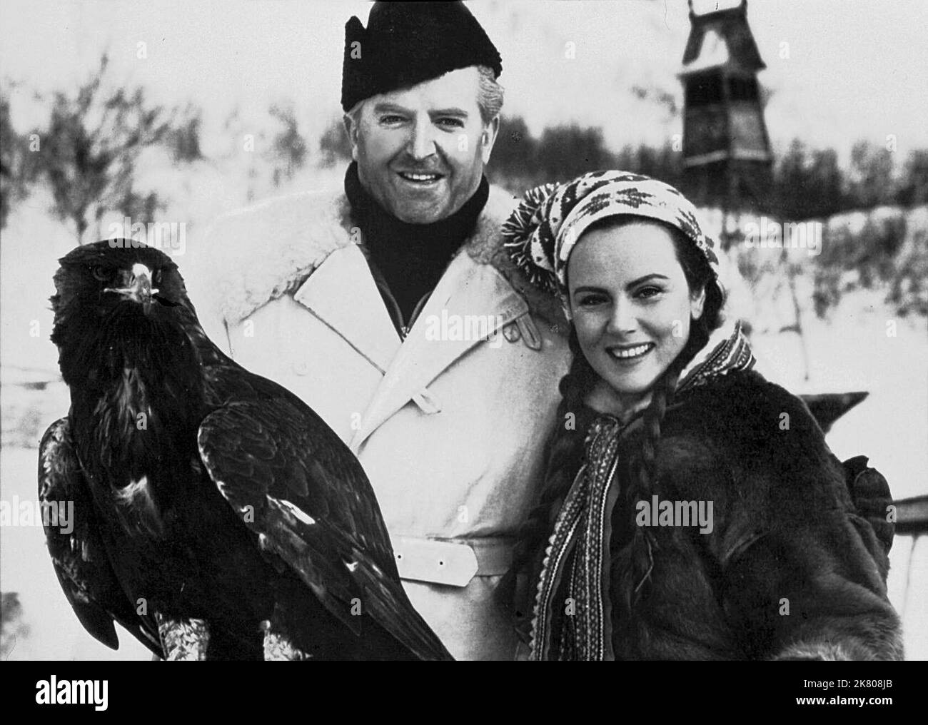 Jack Warner & Nadia Gray Film: Valley Of Eagles (1952) Characters: Inspector Peterson & Kara Niemann  Director: Terence Young 26 September 1951   **WARNING** This Photograph is for editorial use only and is the copyright of The Film Company and/or the Photographer assigned by the Film or Production Company and can only be reproduced by publications in conjunction with the promotion of the above Film. A Mandatory Credit To The Film Company is required. The Photographer should also be credited when known. No commercial use can be granted without written authority from the Film Company. Stock Photo